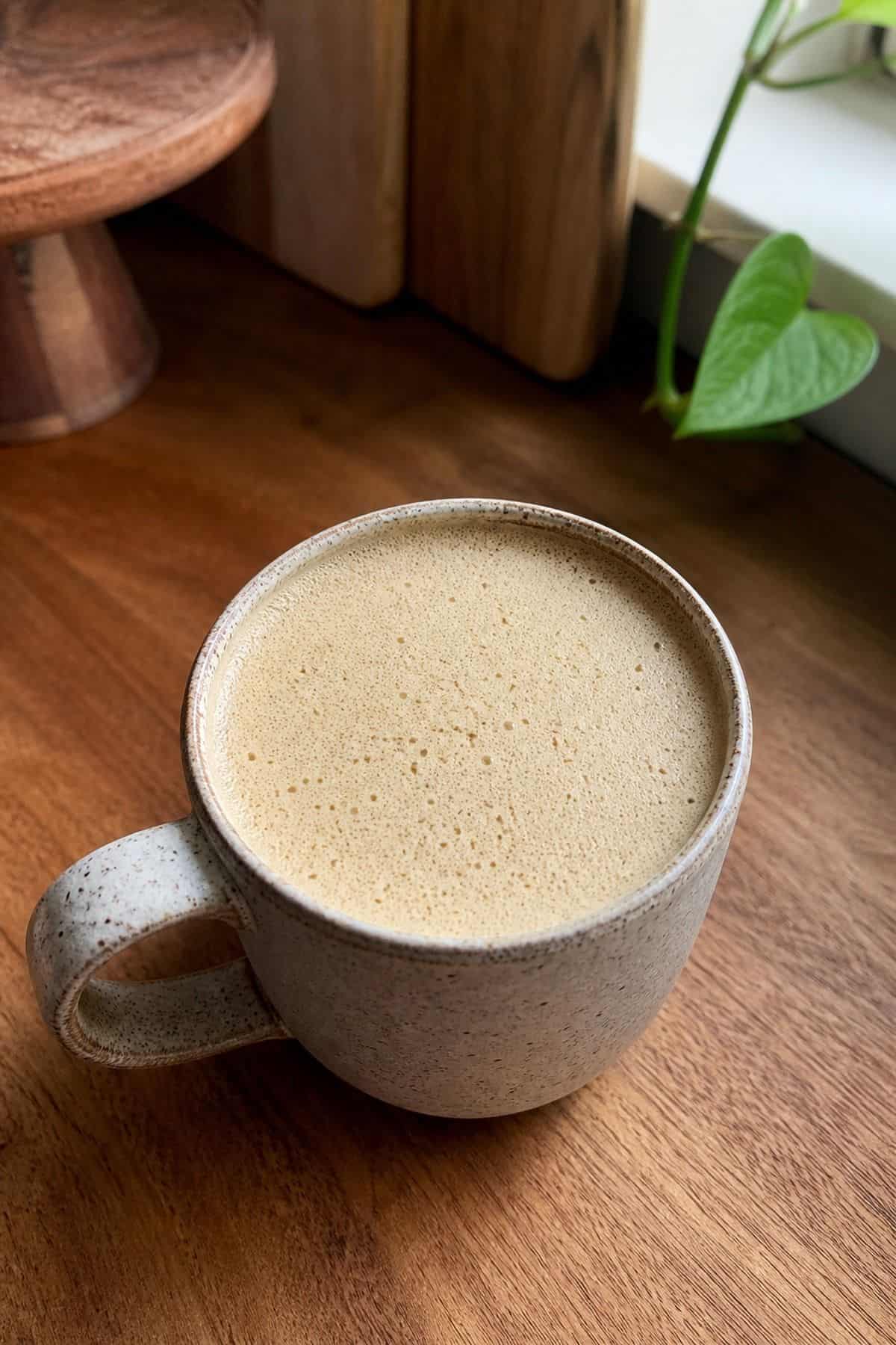 Bulletproof Coffee Recipe: Frothy Keto Coffee in 6 Minutes Creamy bulletproof coffee in a ceramic mug with a frothy foam top