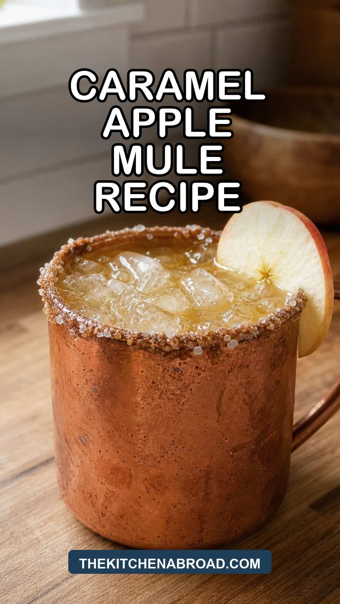 Caramel Apple Mule Recipe Caramel apple mule recipe pin with a copper mug, salted caramel rim, and apple slice