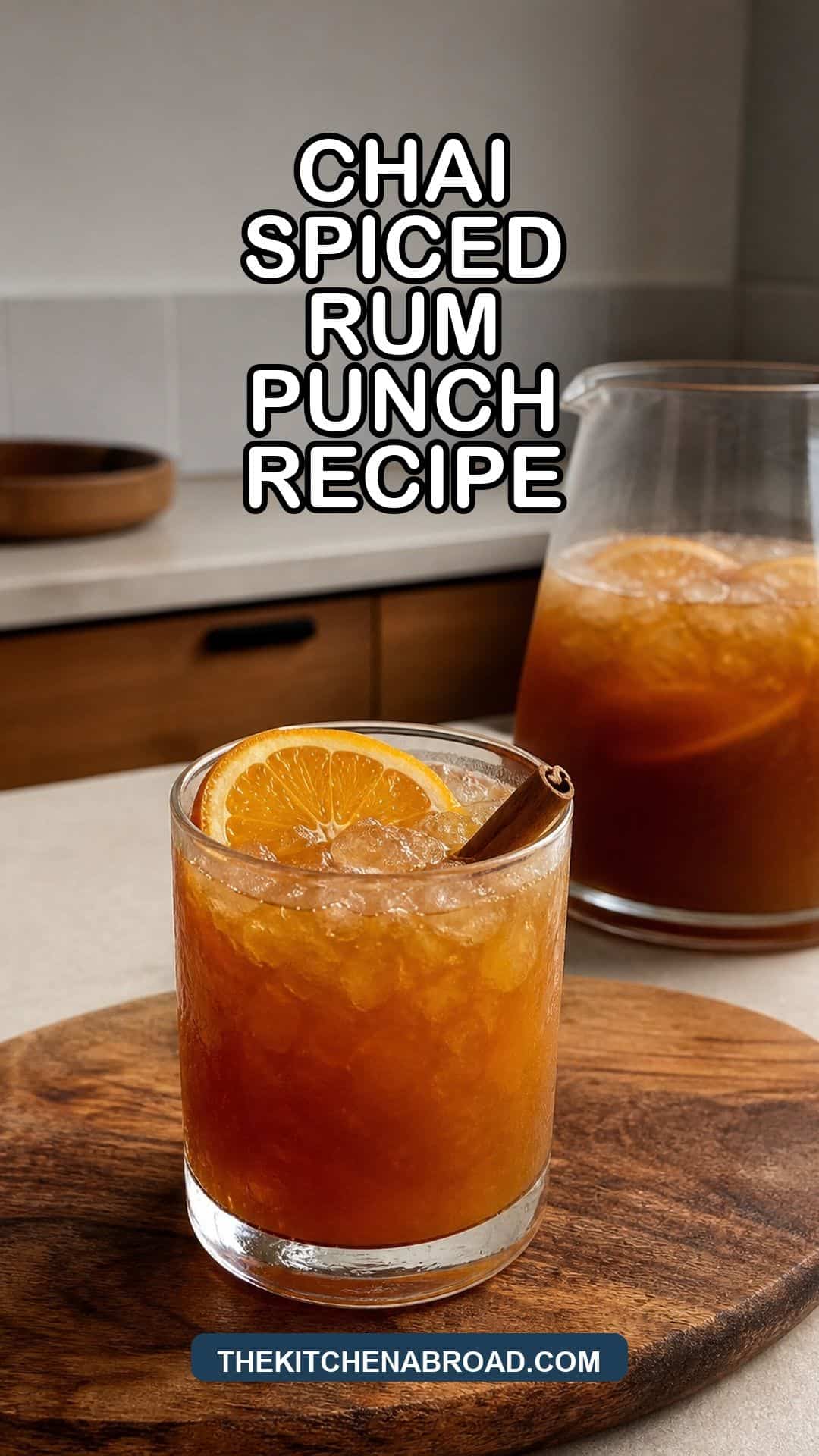 Chai-spiced rum punch recipe served over crushed ice with orange and cinnamon.