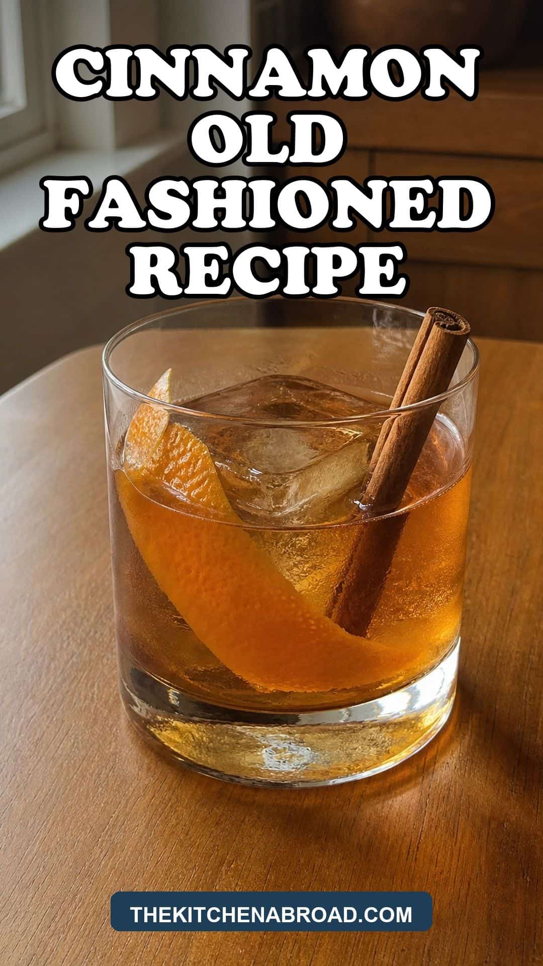 Cinnamon Old Fashioned Recipe pin with a rye whiskey cocktail, orange peel, and cinnamon stick in a rocks glass.
