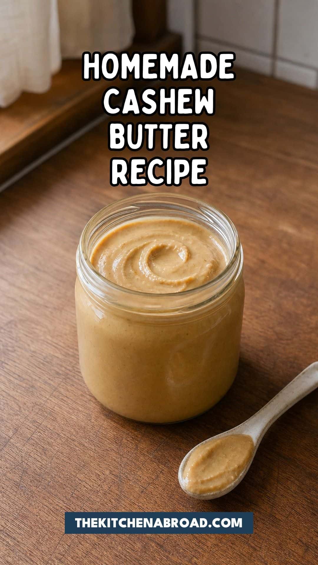 Homemade Cashew Butter That Puts the Store-Bought Stuff to Shame Homemade cashew butter recipe pin with a jar of smooth cashew butter