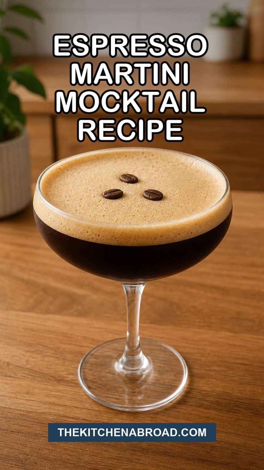 Non-alcoholic espresso martini mocktail recipe with a foamy coffee drink in a coupe glass