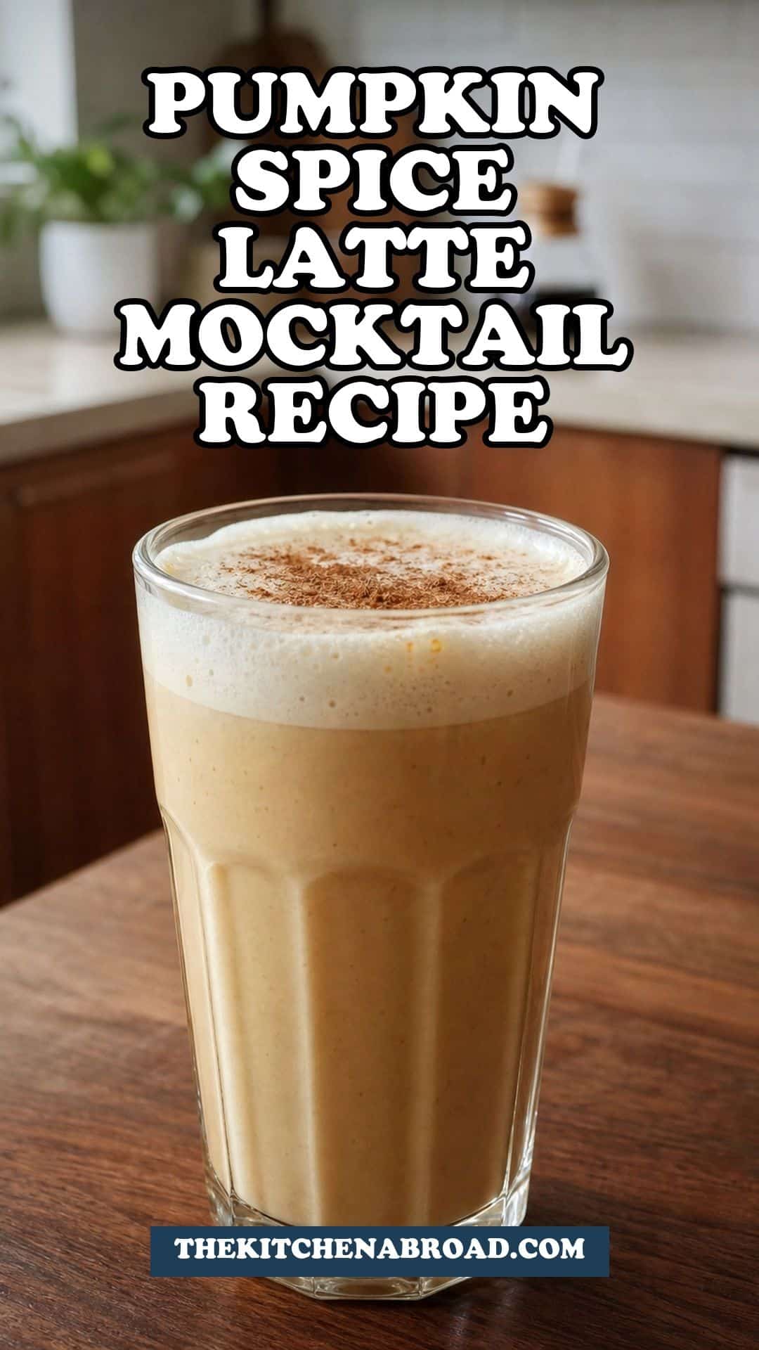 Pumpkin Spice Latte Mocktail Recipe Pinterest pin for pumpkin spice latte mocktail recipe with a creamy latte in a tall glass