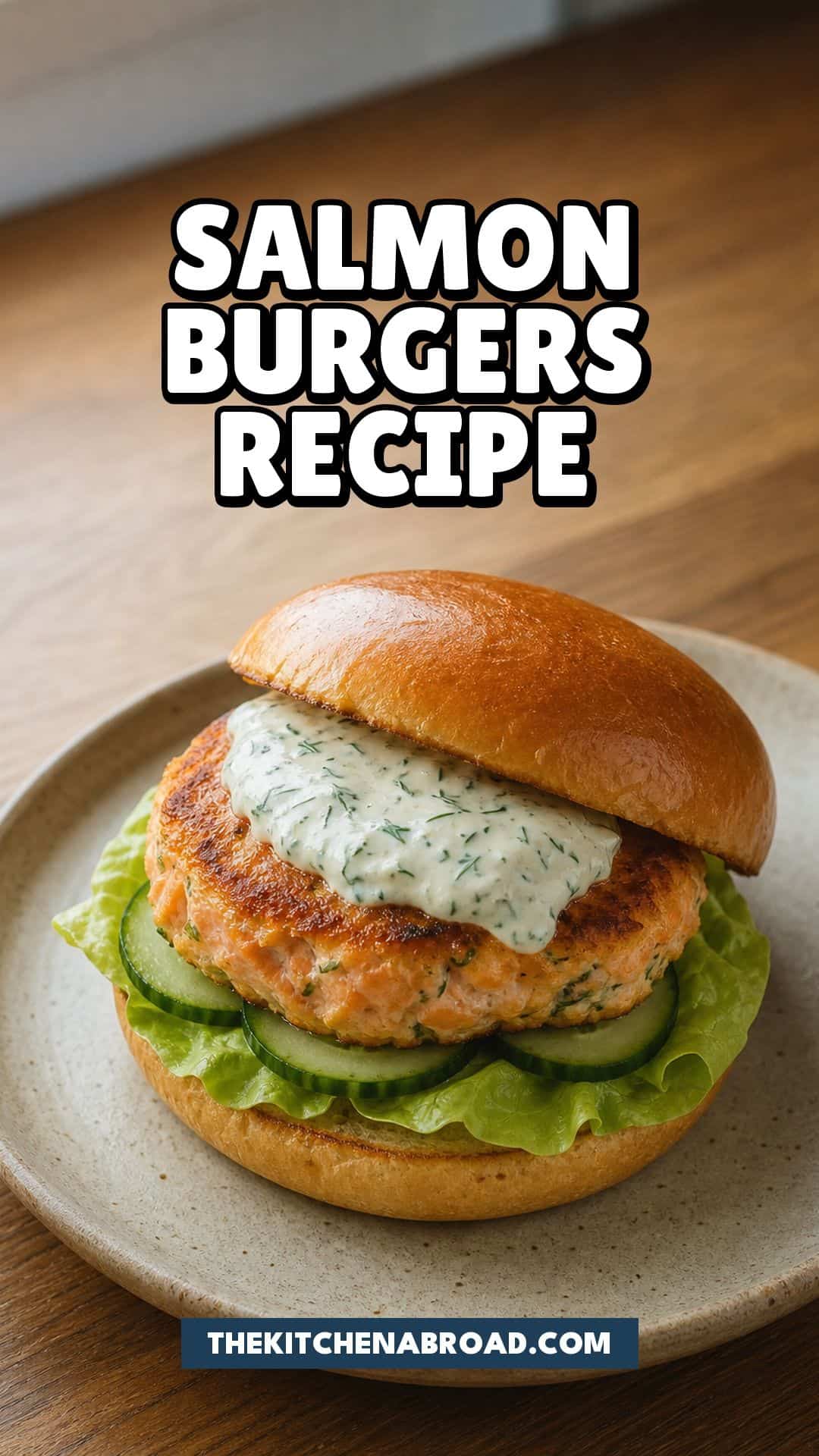 Salmon burgers with lemon dill sauce on a toasted brioche bun