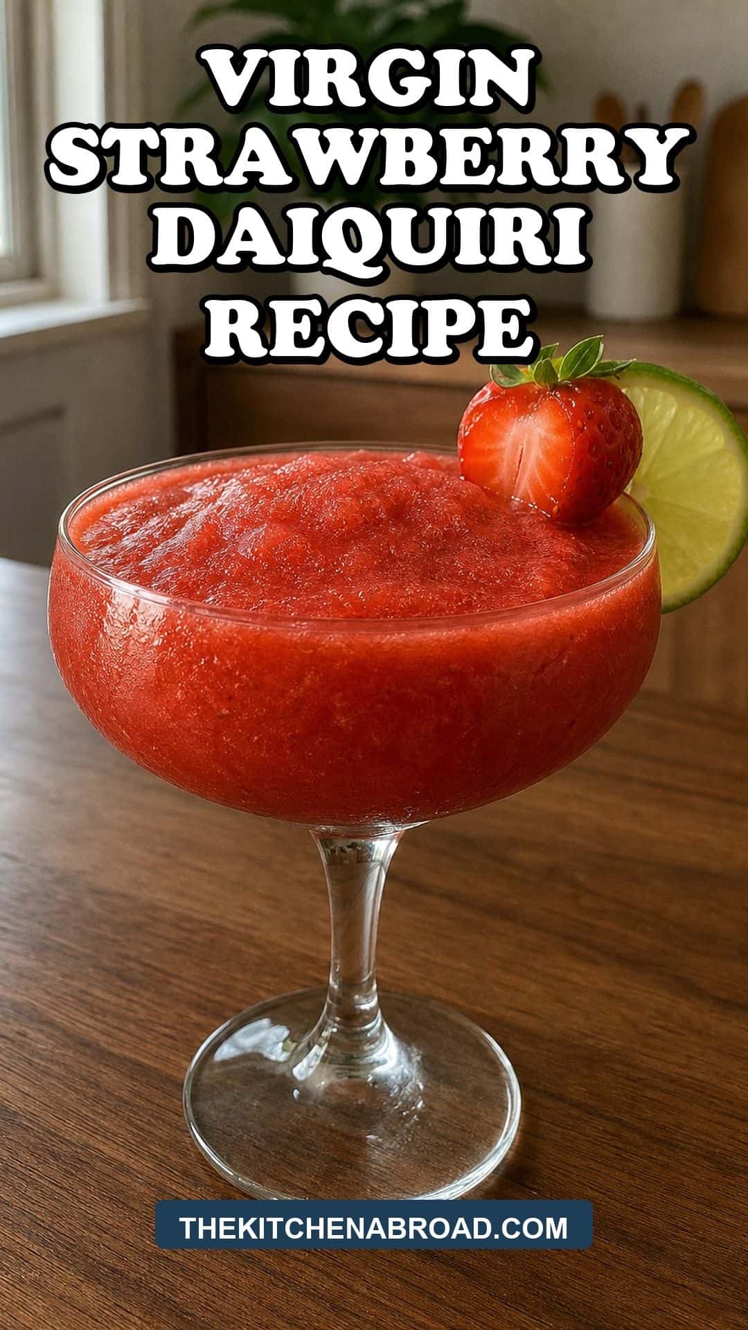 Virgin strawberry daiquiri recipe pin with a frosty strawberry mocktail in a cozy kitchen.