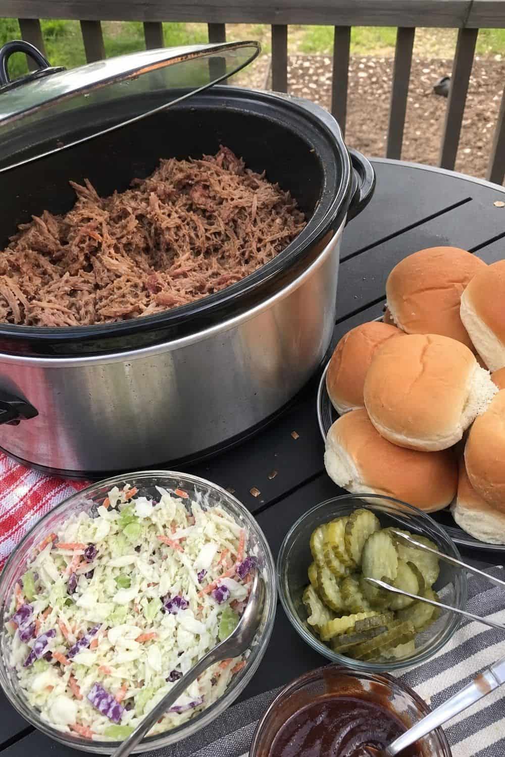 25 Backyard BBQ Food Ideas for a Crowd-Pleasing Summer Menu 4. Pulled Pork Sandwiches From a Warmer for backyard BBQ food ideas