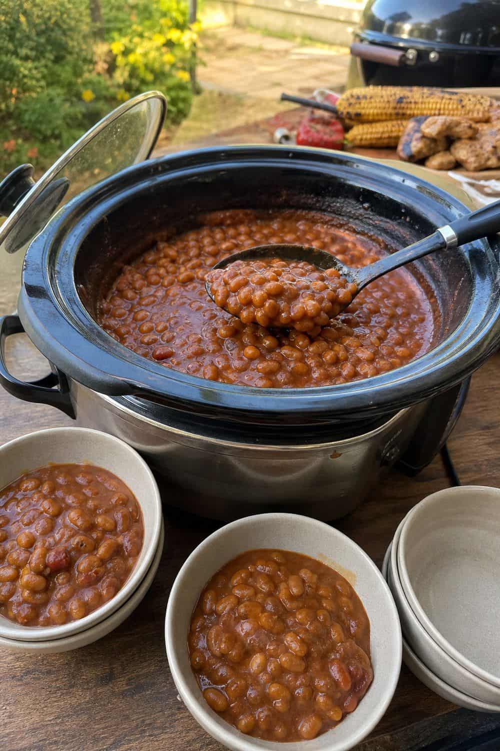 25 Backyard BBQ Food Ideas for a Crowd-Pleasing Summer Menu 11. Baked Beans in a Slow Cooker for backyard BBQ food ideas