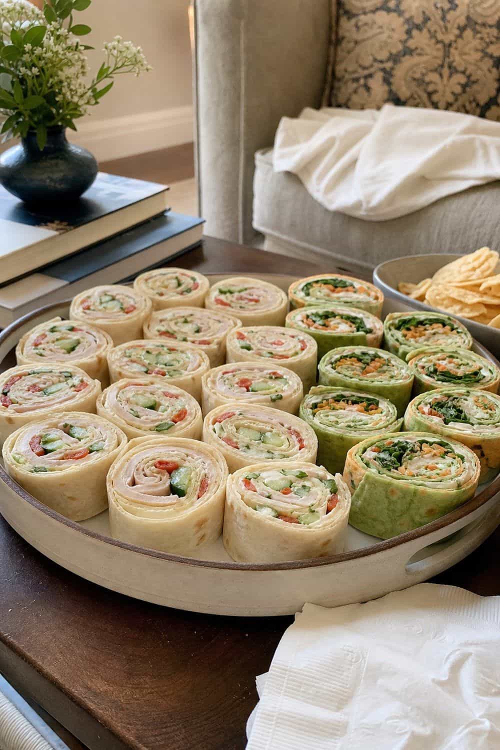 25 Book Club Food Ideas for Easy Conversation and Snacking 1. Serve Pinwheel Sandwiches on a Low Tray for book club food ideas