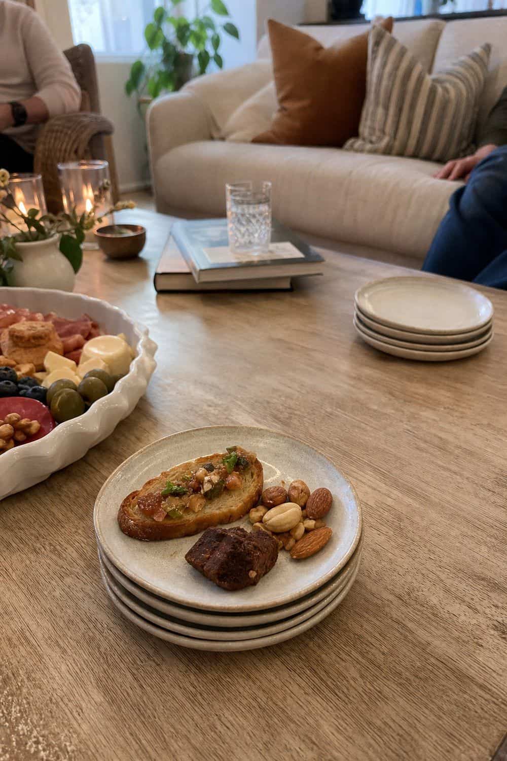 25 Book Club Food Ideas for Easy Conversation and Snacking 17. Use Small Plates for Sofa Seating for book club food ideas