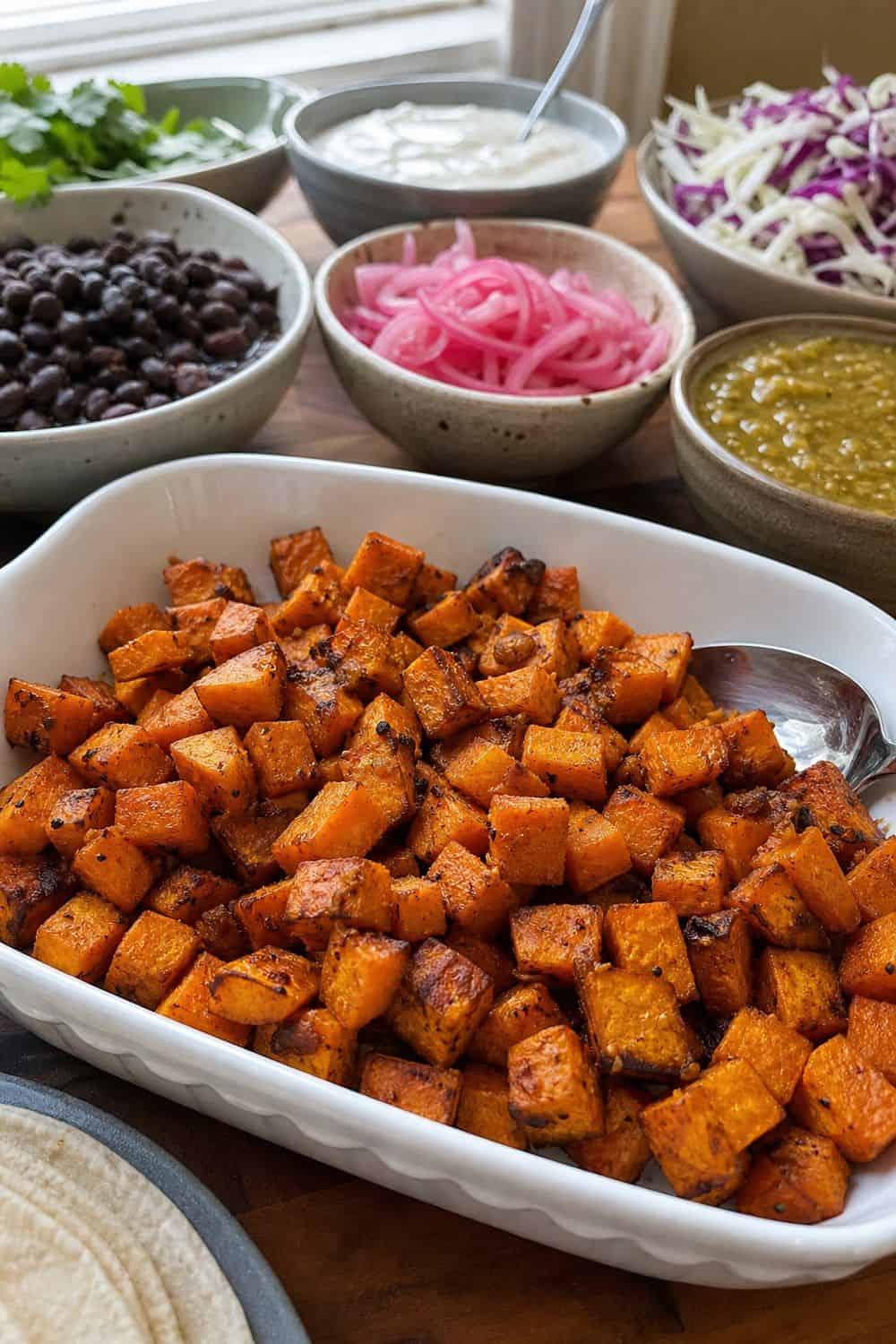 25 Cinco de Mayo Taco Bar Ideas for a Colorful Self-Serve Spread cinco de mayo taco bar ideas section 08 add roasted sweet potato cubes