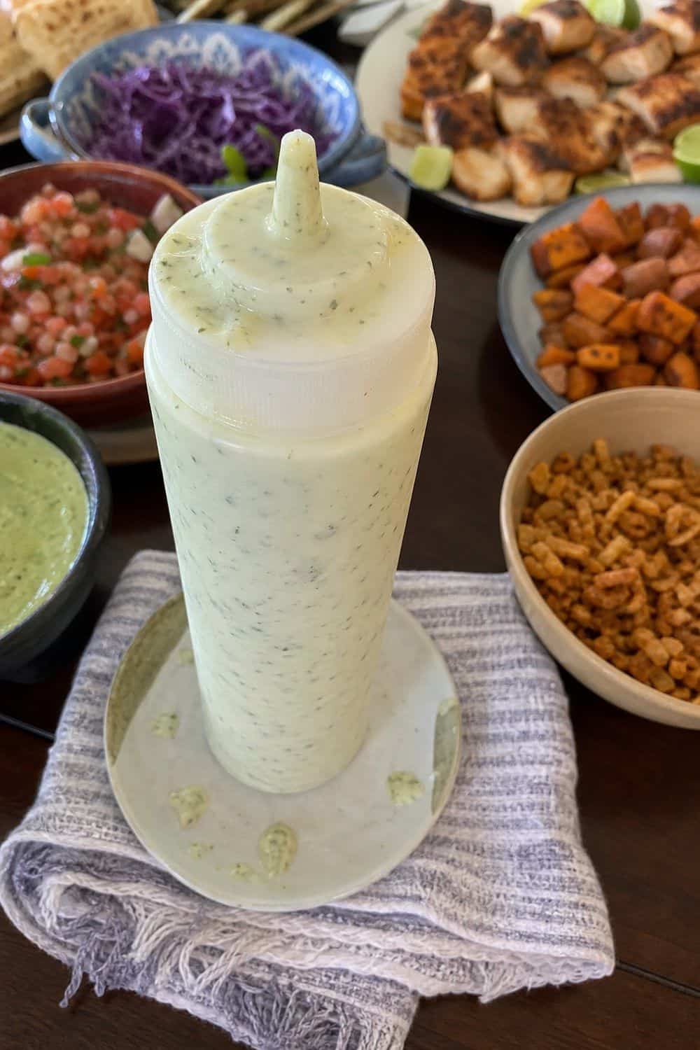25 Cinco de Mayo Taco Bar Ideas for a Colorful Self-Serve Spread cinco de mayo taco bar ideas section 13 serve cilantro lime crema in a squeeze bottle