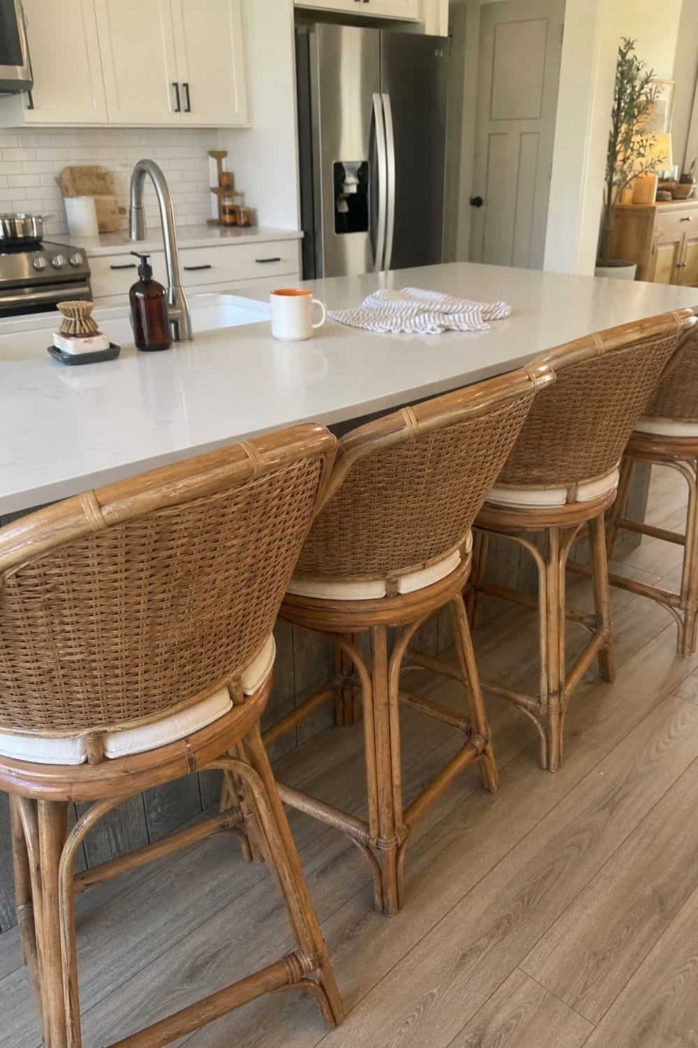 25 Coastal Kitchen Ideas for a Beautiful Kitchen Rattan Counter Stools in a casual coastal kitchen