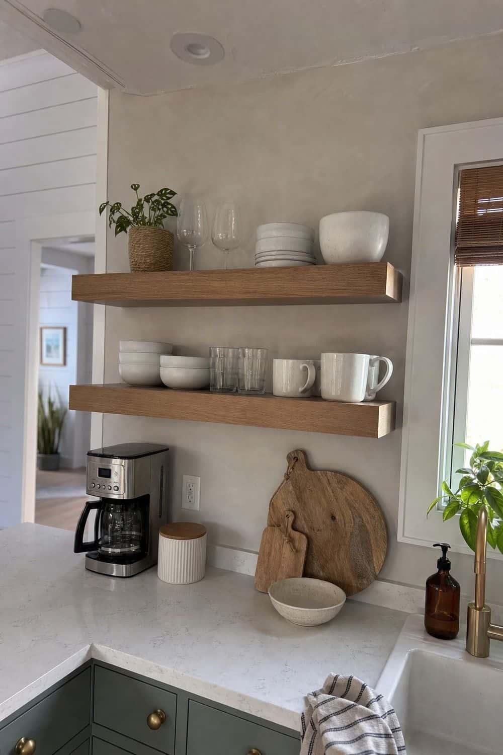 25 Coastal Kitchen Ideas for a Beautiful Kitchen Open Wood Shelves for Everyday Dishes in a casual coastal kitchen