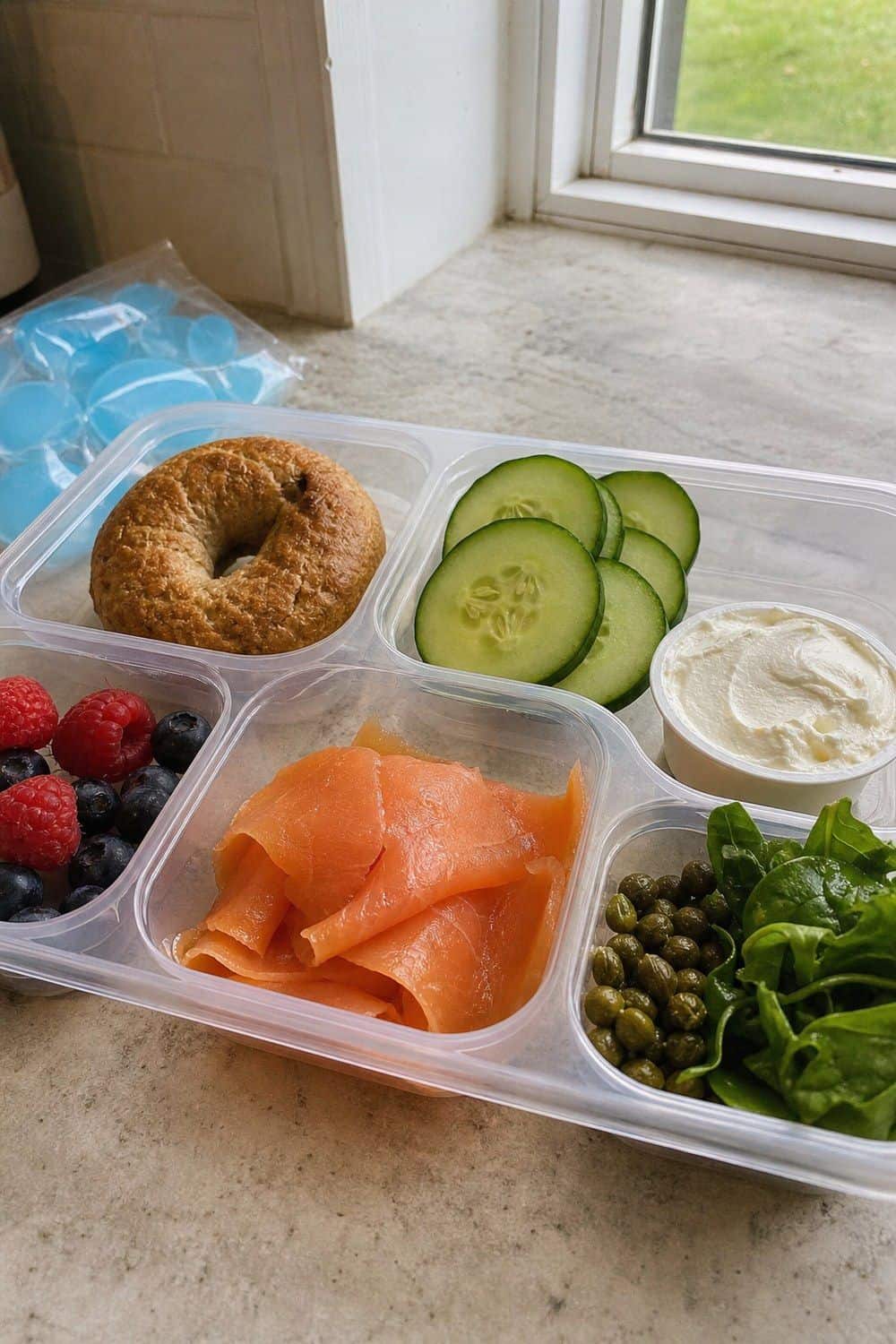 20 Cold Lunch Meal Prep Ideas That Make Life Easier 11. Smoked Salmon Bagel Lunch Box cold lunch meal prep idea in a packed lunch container