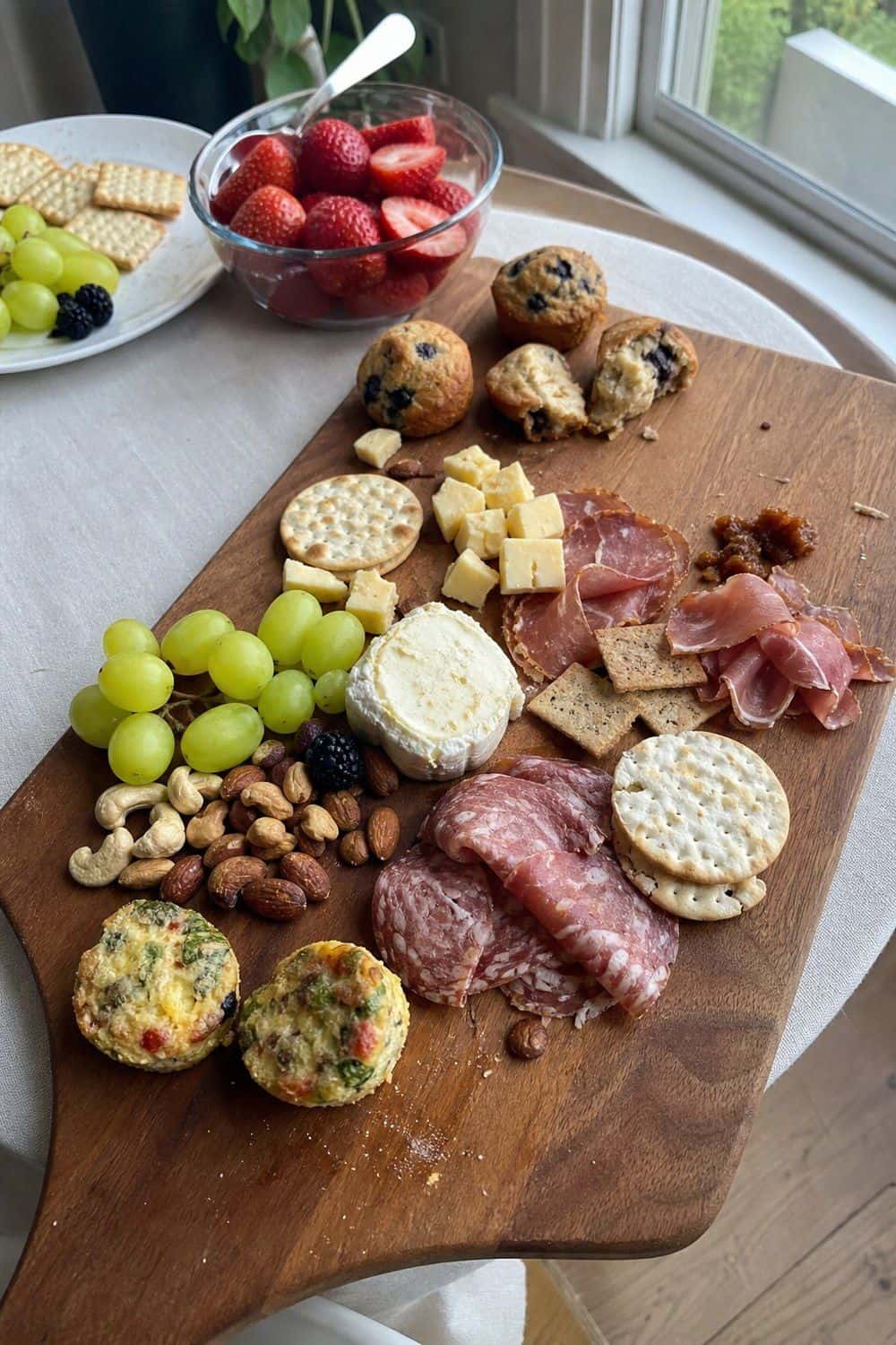 25 Graduation Brunch Hosting Ideas for an Open-House Crowd graduation brunch hosting ideas 10 add a brunch charcuterie tray