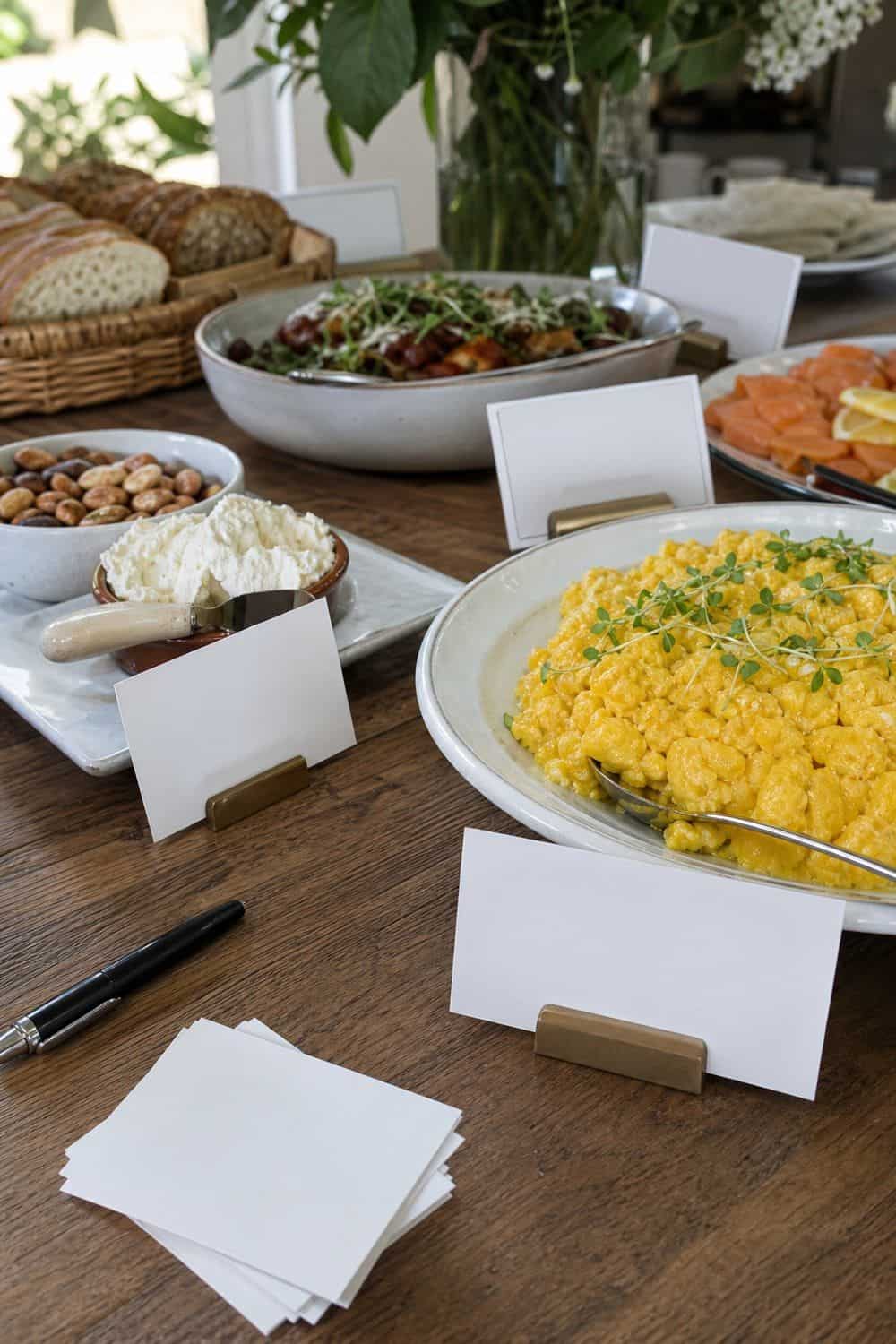 25 Graduation Brunch Hosting Ideas for an Open-House Crowd graduation brunch hosting ideas 13 label every food with simple cards