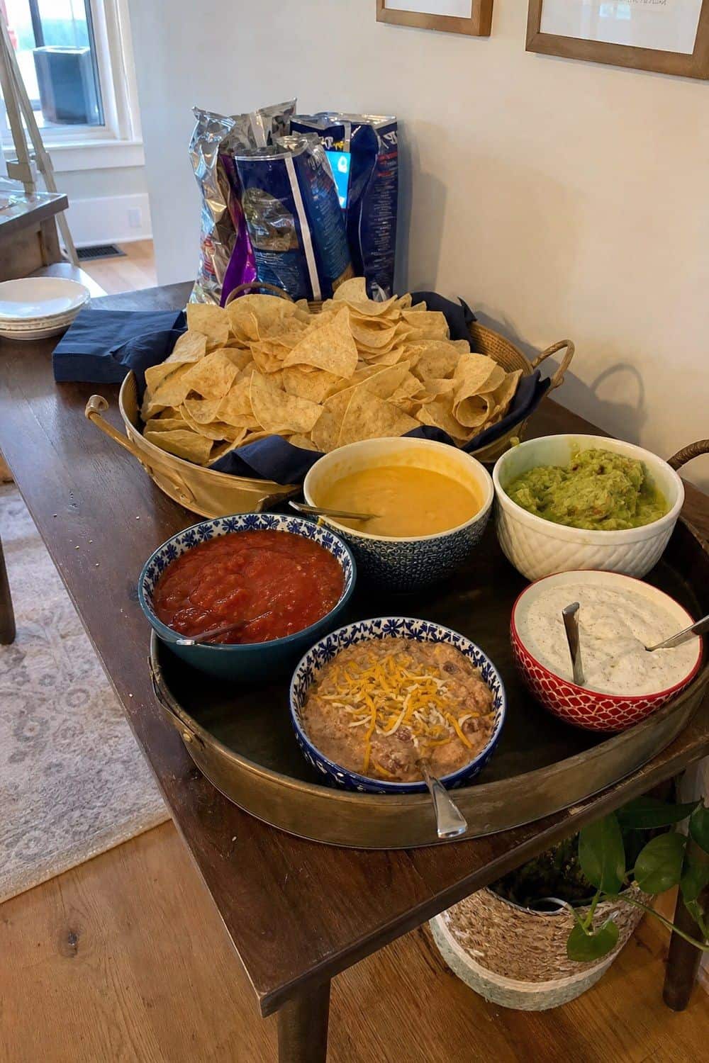 25 Graduation Party Food Ideas for a Crowd-Friendly Buffet Create a Chips and Dip Table Away From the Main Line for a graduation party buffet