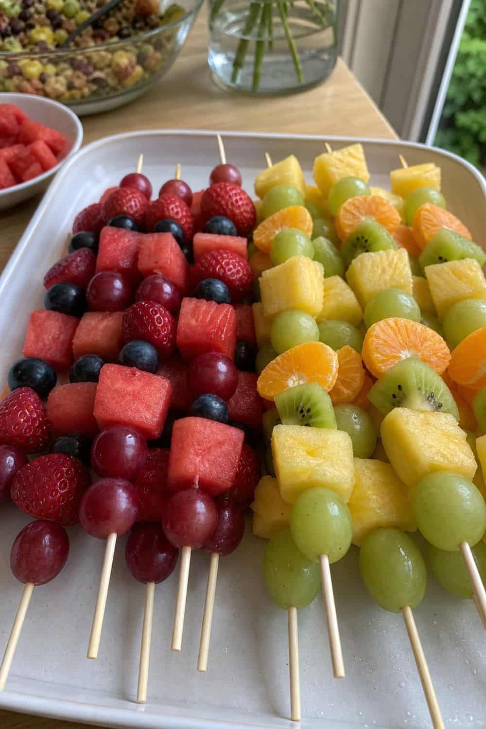 25 Graduation Party Food Ideas for a Crowd-Friendly Buffet Serve Fruit Skewers in School Colors for a graduation party buffet