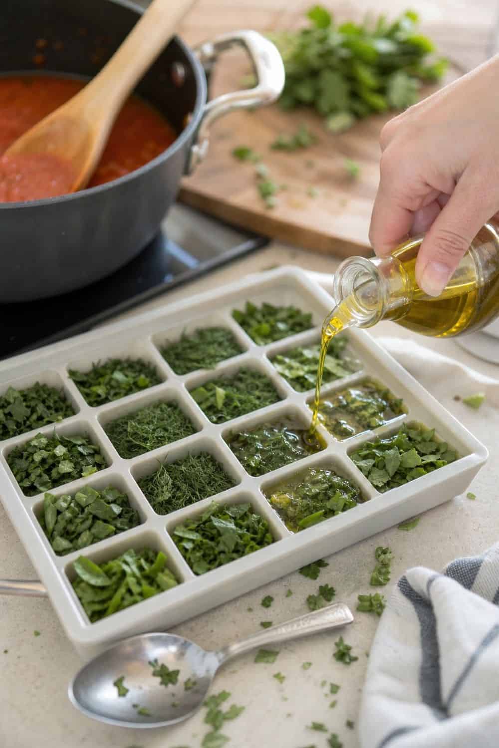 20 Herb Storage Ideas That Keep Food Fresh 12. Make Herb Cubes for Soups and Sauces for 20 Herb Storage Ideas That Keep Food Fresh