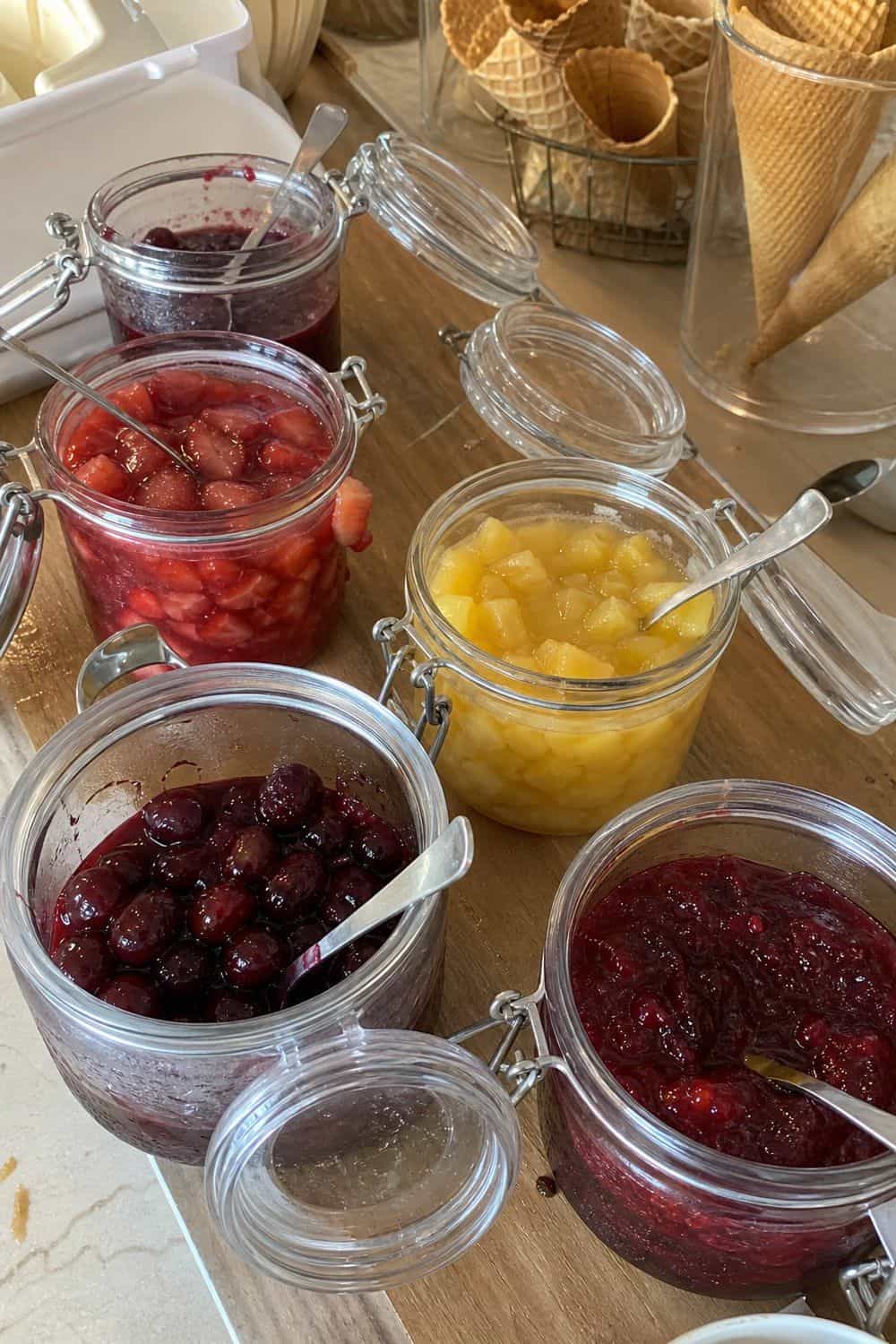 25 Ice Cream Bar Ideas for a Fun Self-Serve Dessert Table 14. Keep Cherries and Wet Toppings in Lidded Containers setup for an ice cream bar