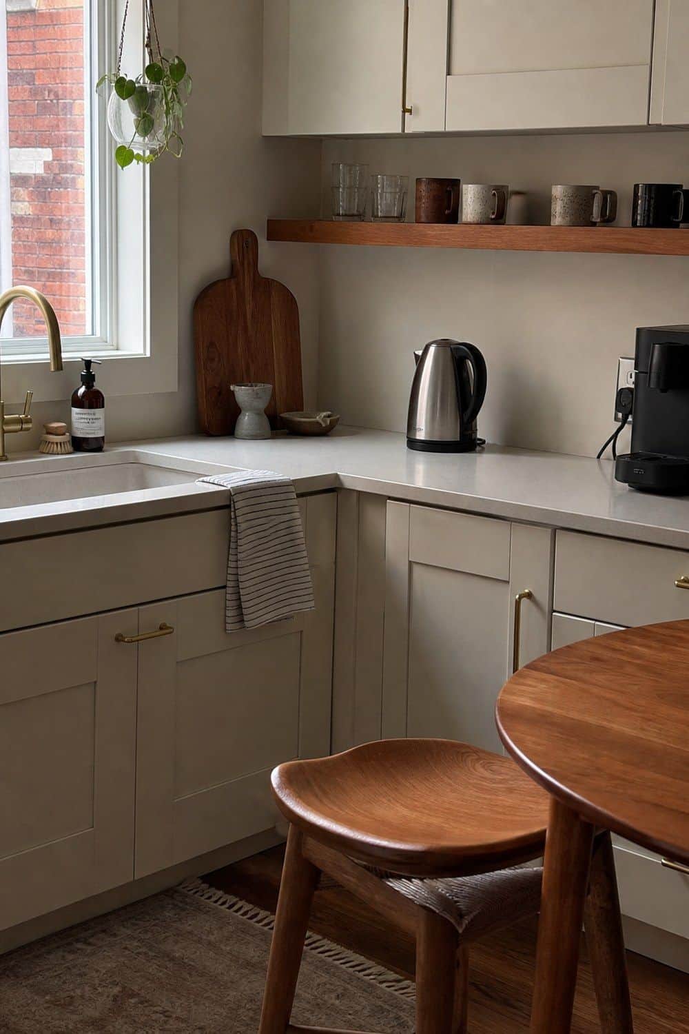 2. Teak Accents Instead of Full Teak Cabinets in a casual mid-century modern kitchen with realistic retro warmth and everyday home details