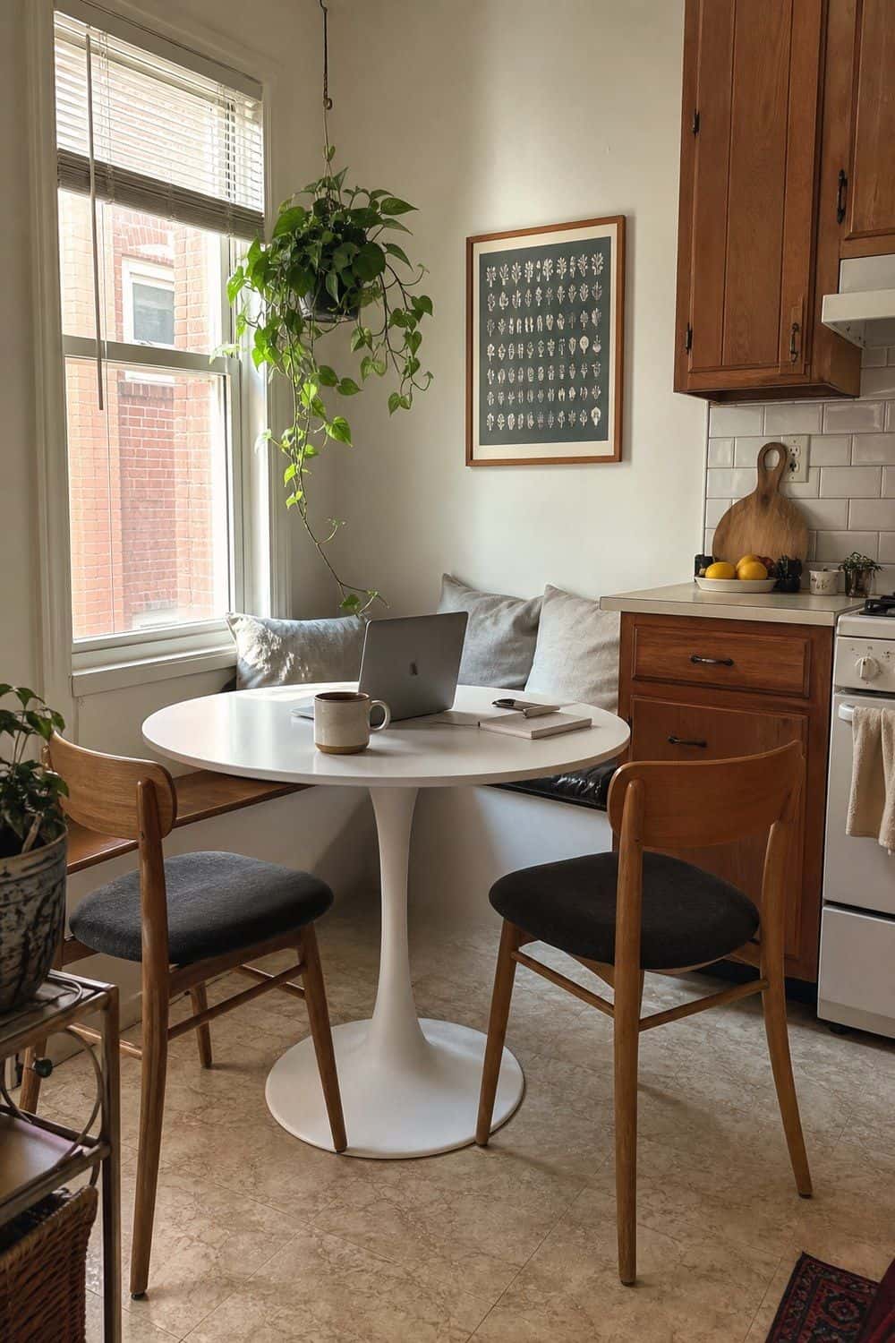13. Pedestal Table for an Eat-In Corner in a casual mid-century modern kitchen with realistic retro warmth and everyday home details