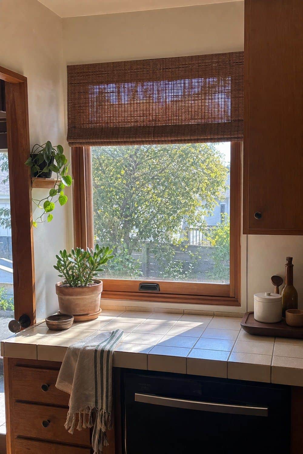 19. Natural Light as a Design Feature in a casual mid-century modern kitchen with realistic retro warmth and everyday home details