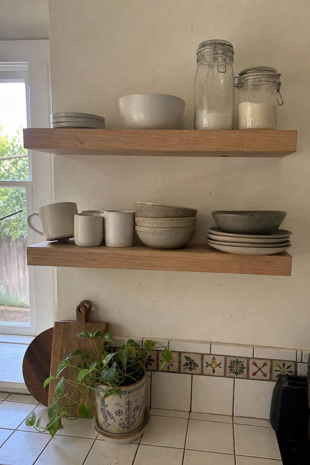 25 Best Natural Wood Kitchen Decor Finds Oak Floating Shelves for Open Kitchen Display in a natural wood kitchen decor setup