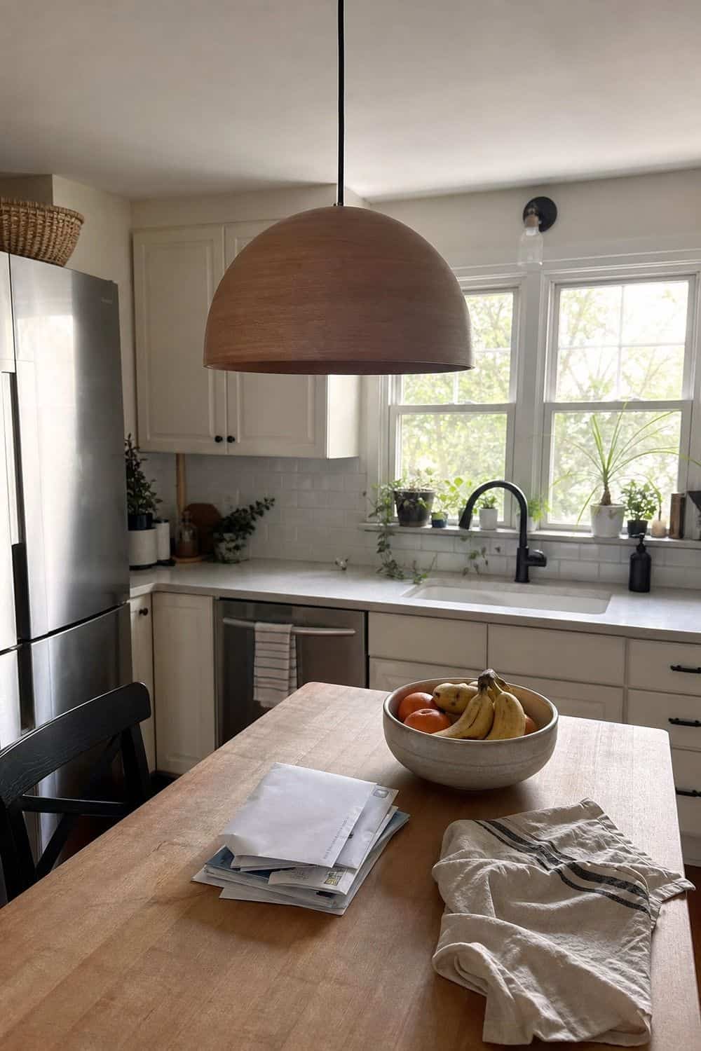 25 Best Natural Wood Kitchen Decor Finds Pendant Light as a Natural Focal Point in a natural wood kitchen decor setup