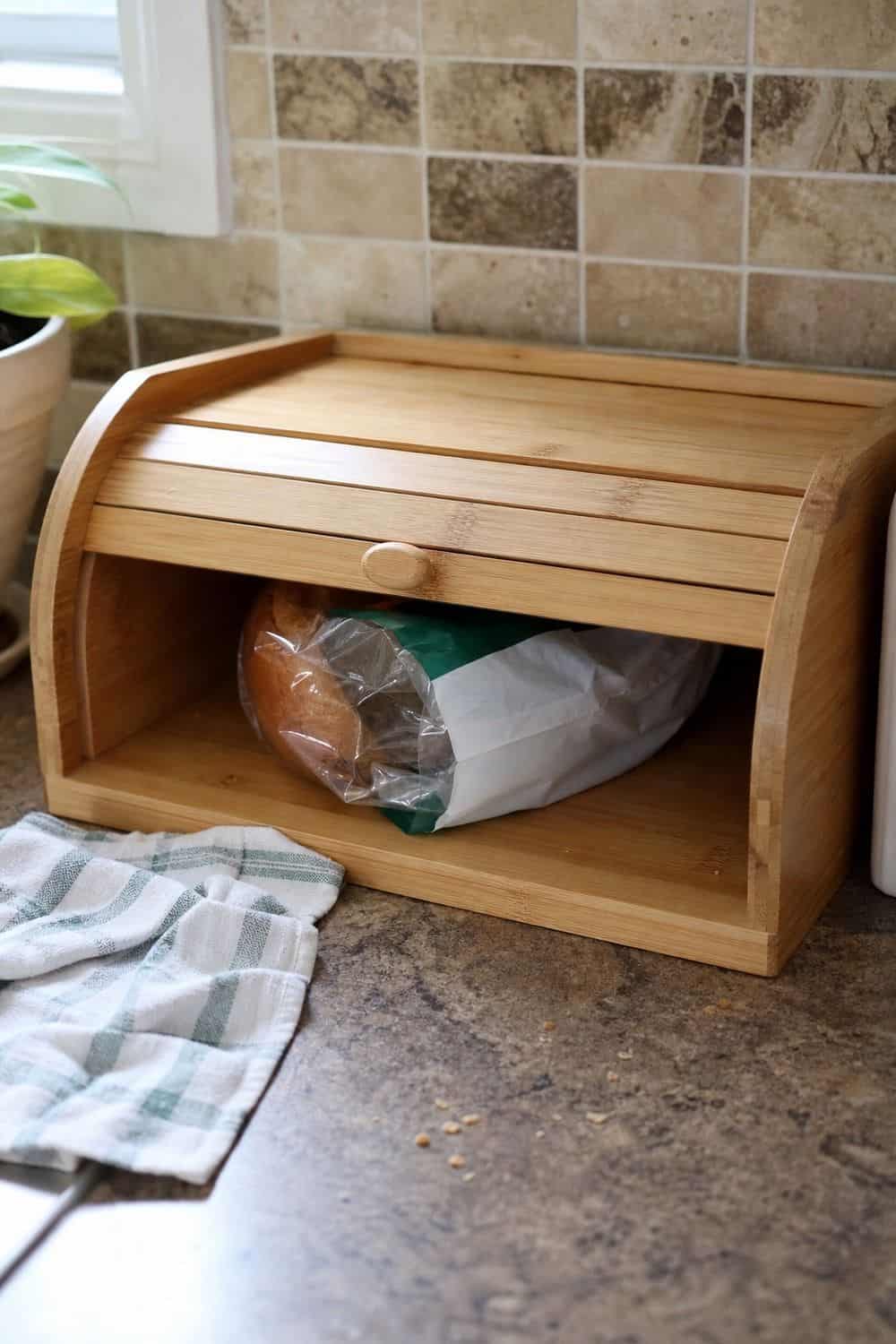 25 Best Natural Wood Kitchen Decor Finds Bread Box for Cleaner Counter Storage in a natural wood kitchen decor setup