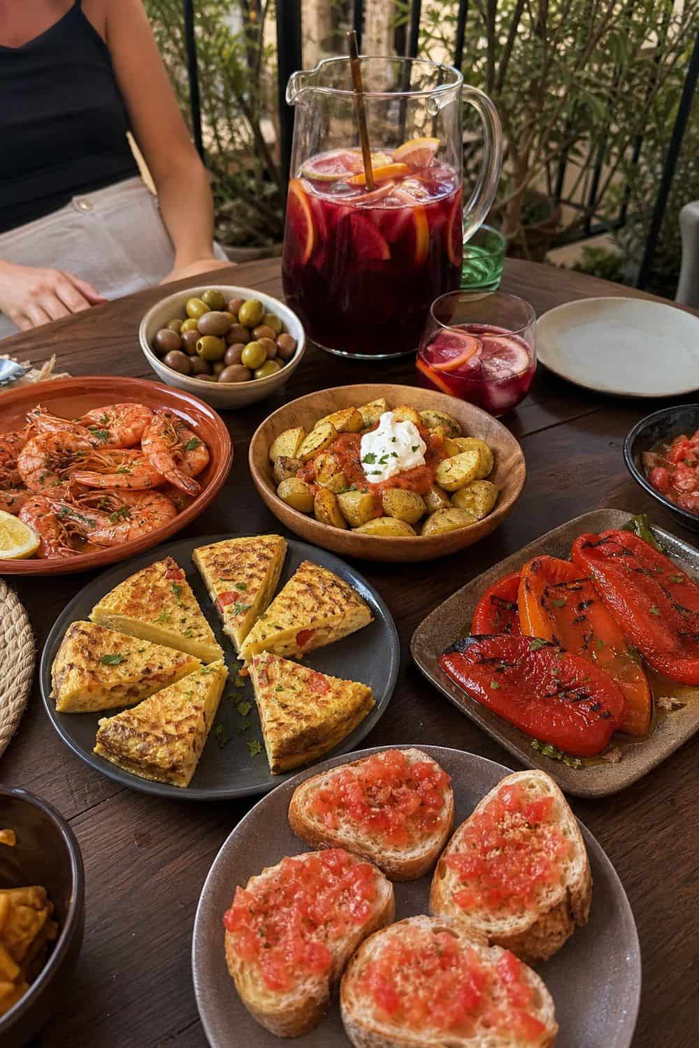 25 Summer Dinner Party Menu Ideas for Warm-Weather Hosting spanish tapas and sangria night for a summer dinner party menu