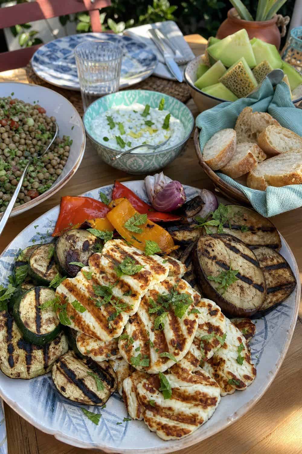 25 Summer Dinner Party Menu Ideas for Warm-Weather Hosting grilled halloumi and vegetable dinner for a summer dinner party menu