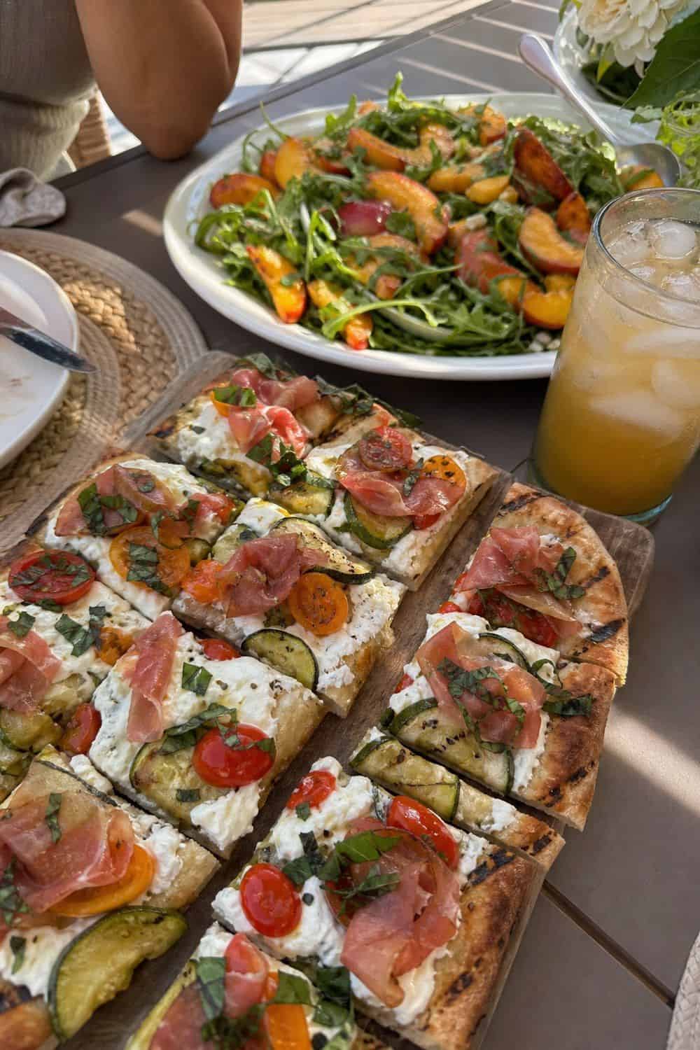 25 Summer Dinner Party Menu Ideas for Warm-Weather Hosting grilled flatbread and peach salad menu for a summer dinner party menu