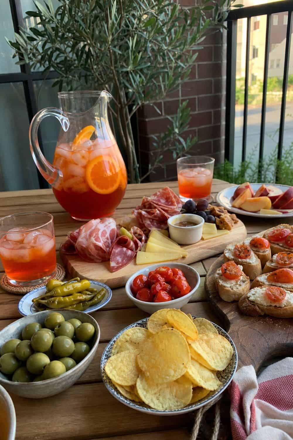 25 Summer Dinner Party Menu Ideas for Warm-Weather Hosting aperitivo dinner with spritz pitchers for a summer dinner party menu