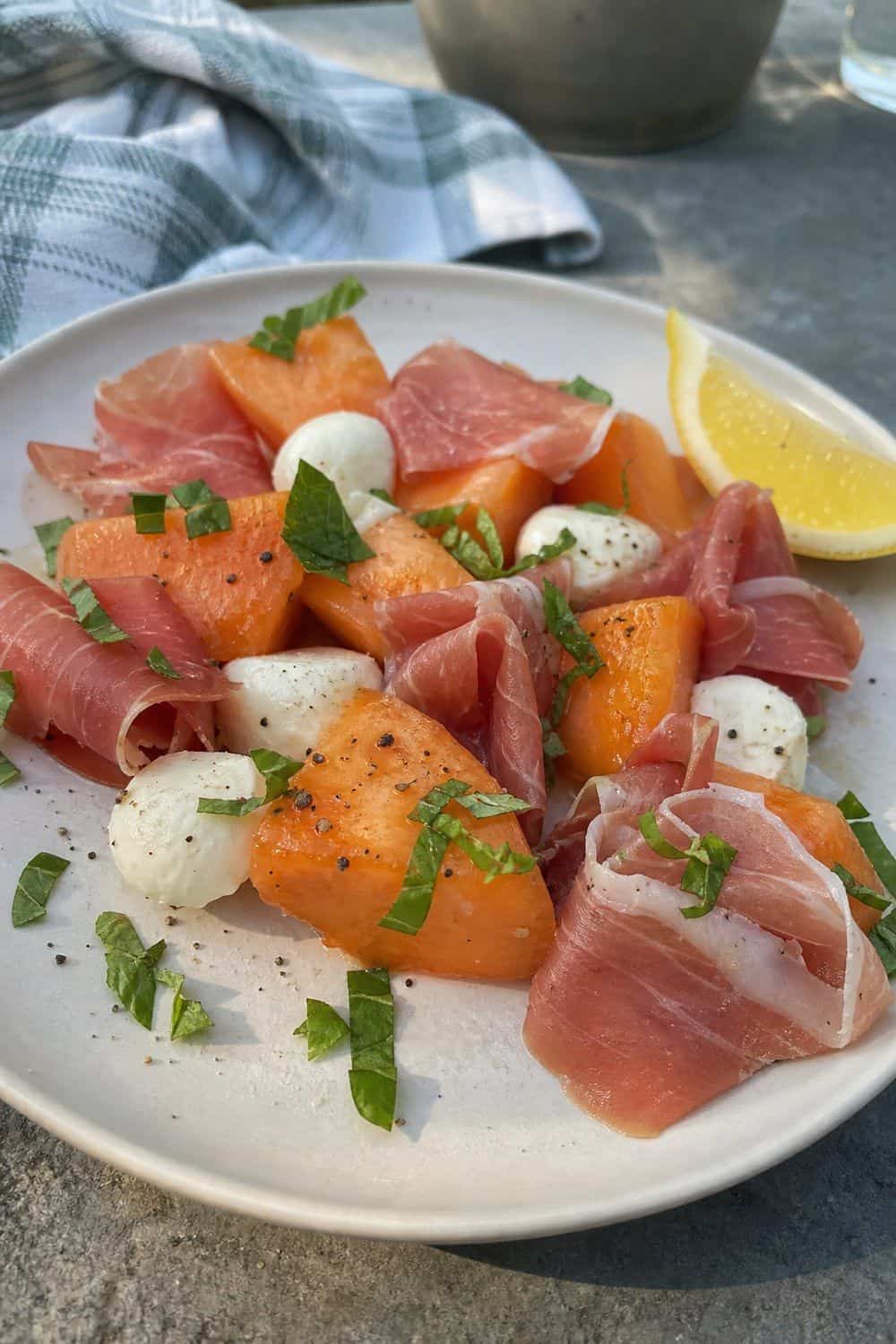 20 Summer Snack Plate Ideas for Hot Weather 14. Melon Prosciutto Mozzarella Plate summer snack plate