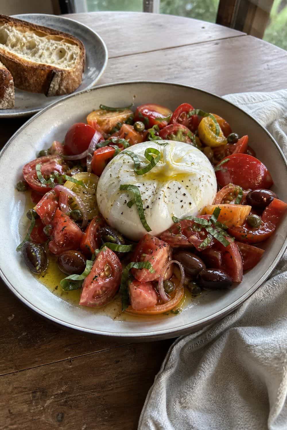 25 Tomato Dinner Party Ideas for Peak Summer Flavor tomato dinner party ideas section 02 serve burrata with tomato spoon salad