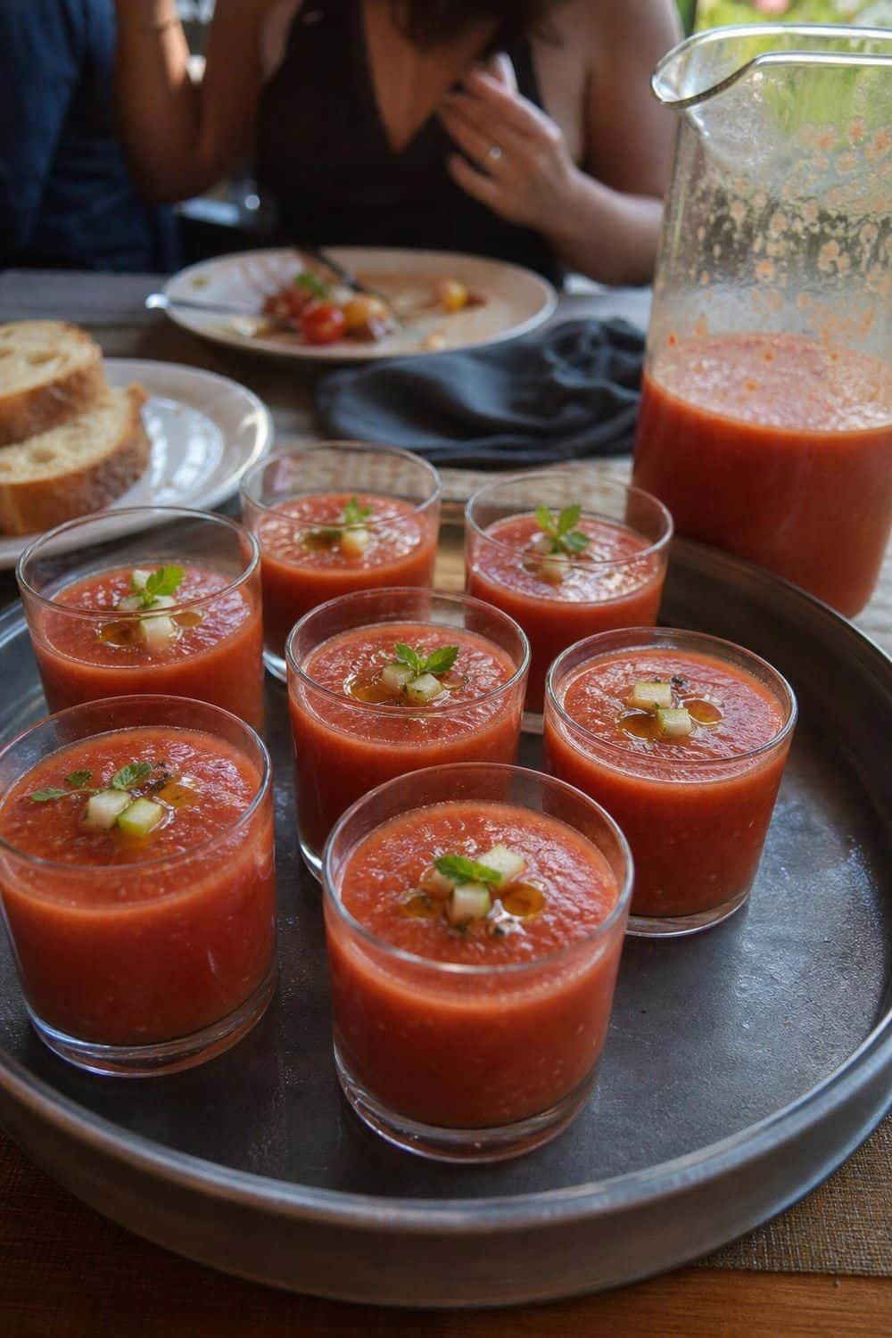 25 Tomato Dinner Party Ideas for Peak Summer Flavor tomato dinner party ideas section 04 pour chilled gazpacho in small glasses