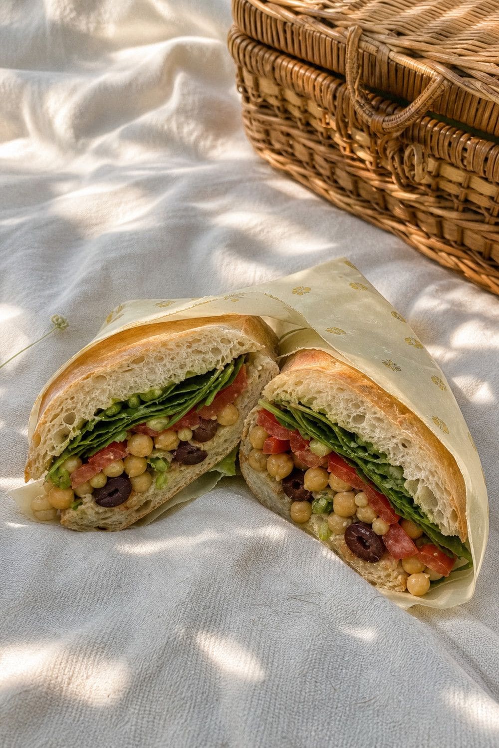 20 Aesthetic Picnic Food Ideas for Cozy Food Moments aesthetic picnic food ideas 01 pressed pan bagnat sandwiches
