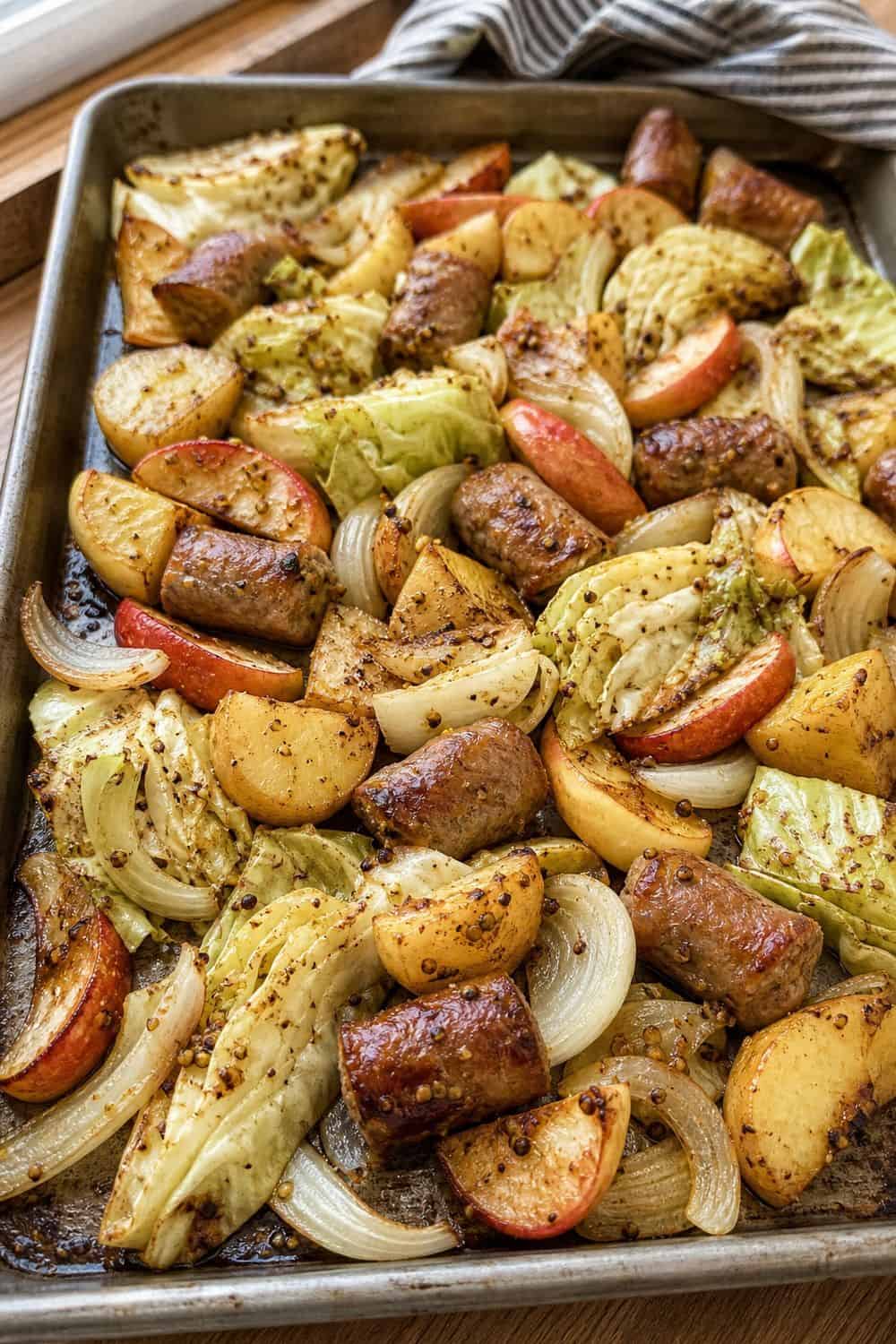 15 Apple Season Food Ideas for Cozy Food Moments sheet-pan sausage apples and onions with apples for a cozy apple season food idea
