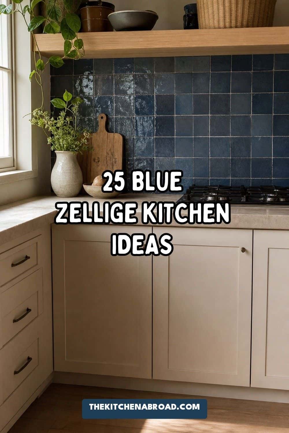 25 Blue Zellige Kitchen Ideas: Shades, Grout and Pairings Kitchen with a blue zellige tile backsplash, cream cabinets and oak shelf