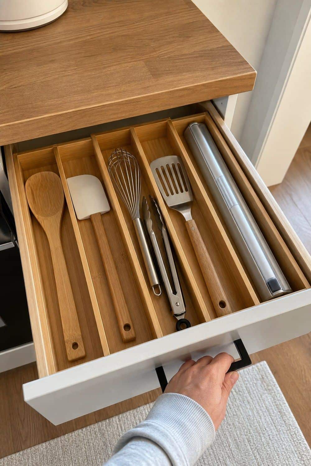 25 Budget Kitchen Organization Ideas for a Tidier Kitchen 7. Expandable Dividers for Long Utensils