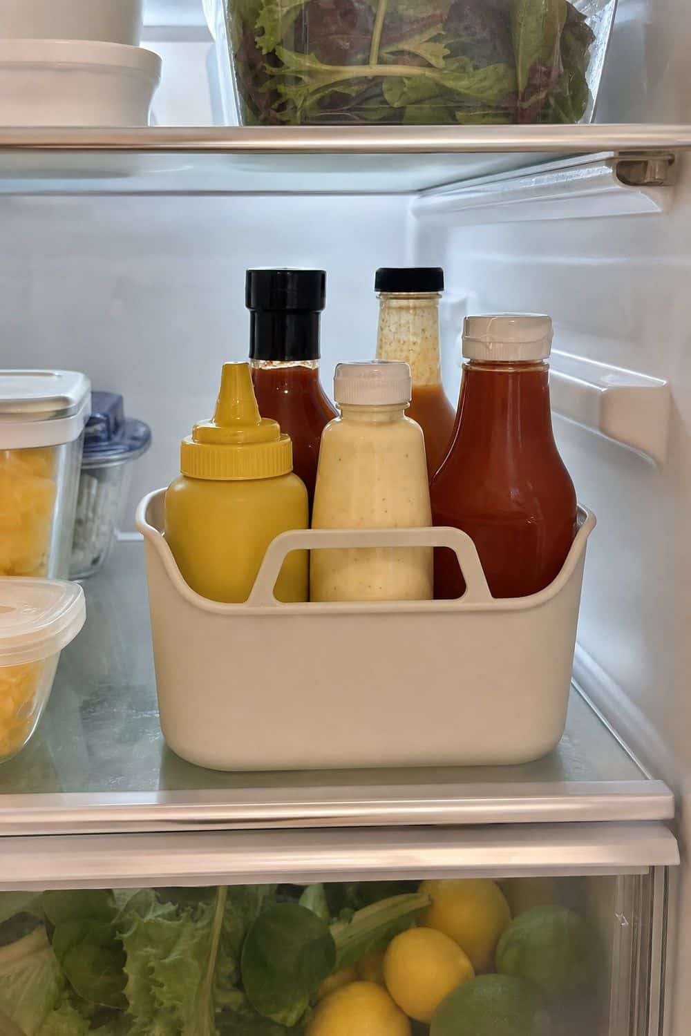25 Budget Kitchen Organization Ideas for a Tidier Kitchen 15. Eat-First Fridge Bin
