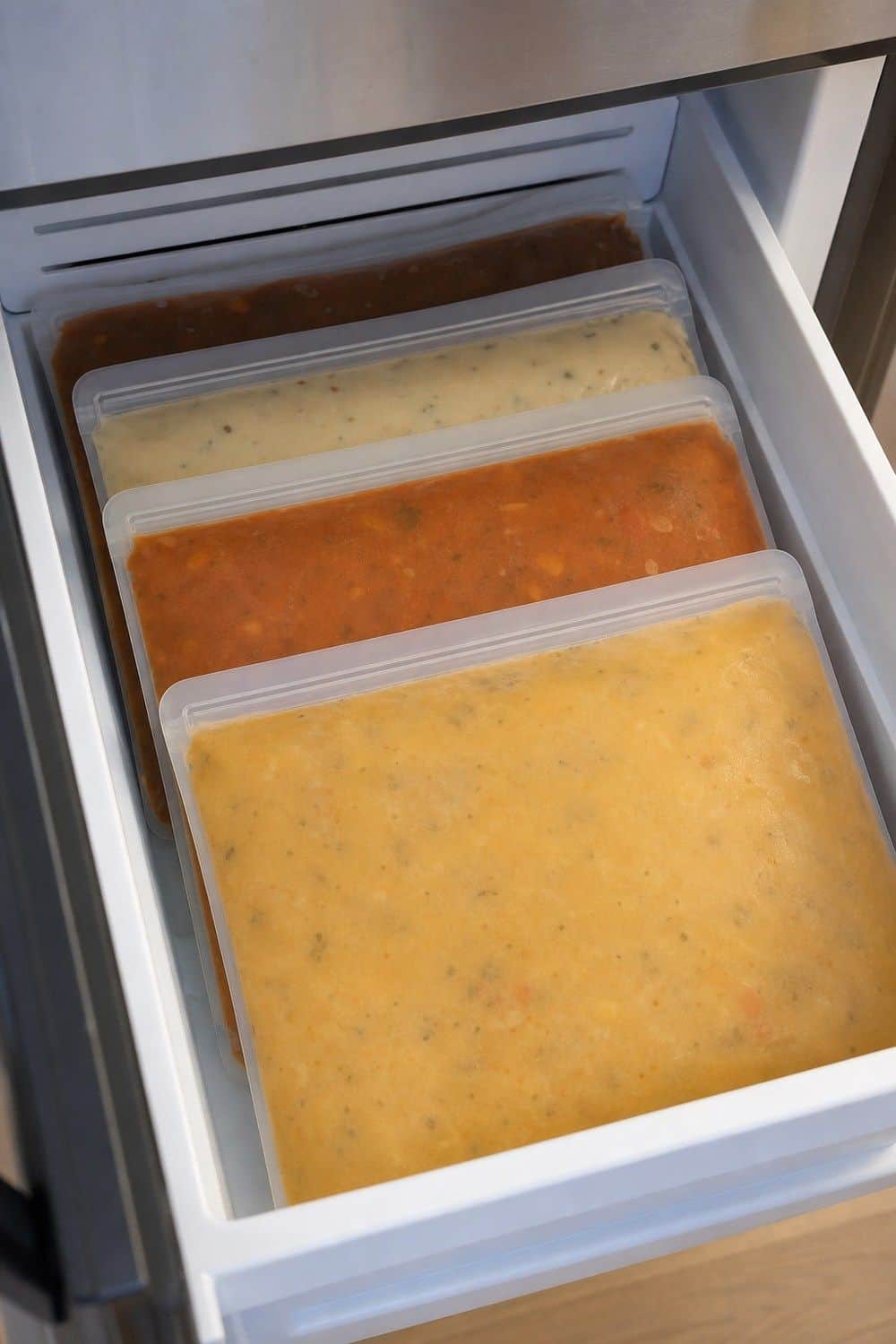 25 Budget Kitchen Organization Ideas for a Tidier Kitchen 17. Flat-Frozen Soup and Sauces