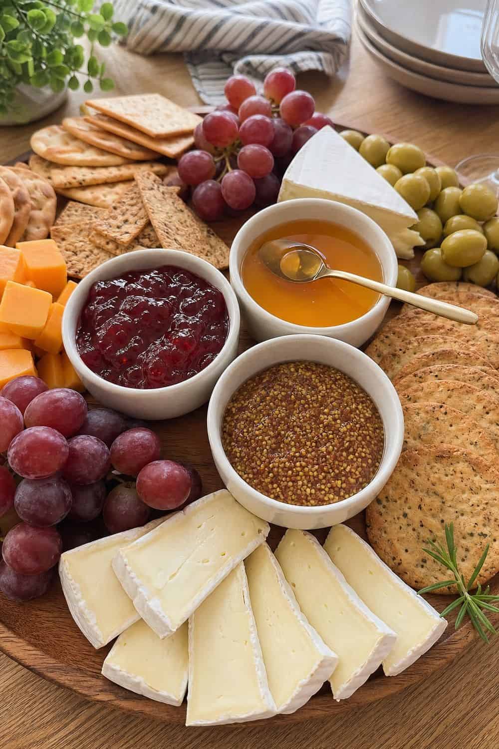 25 Christmas Appetizer Board Ideas for Easy Hosting 25 Christmas Appetizer Board Ideas for Easy Hosting: 9. Put Jams, Honey, and Mustard in Small Bowls