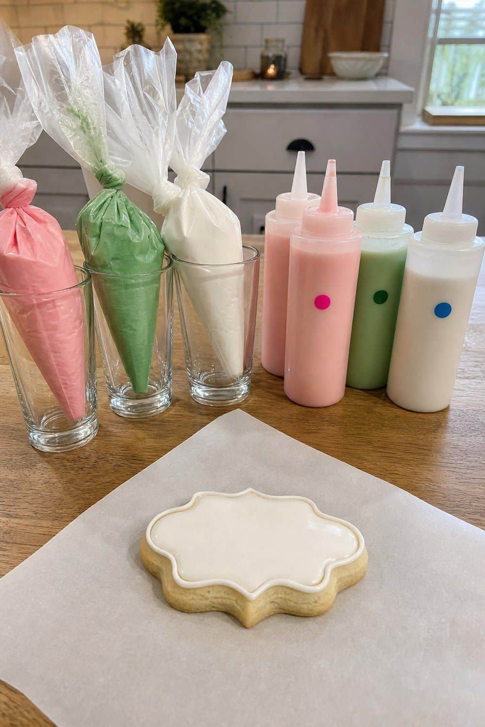 25 Christmas Cookie Decorating Party Ideas for Easy Hosting Separate Piping and Flooding Icing setup for a Christmas cookie decorating party