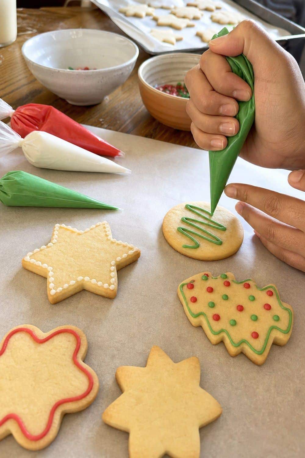 25 Christmas Cookie Decorating Party Ideas for Easy Hosting Tipless Bags for Beginner Lines setup for a Christmas cookie decorating party