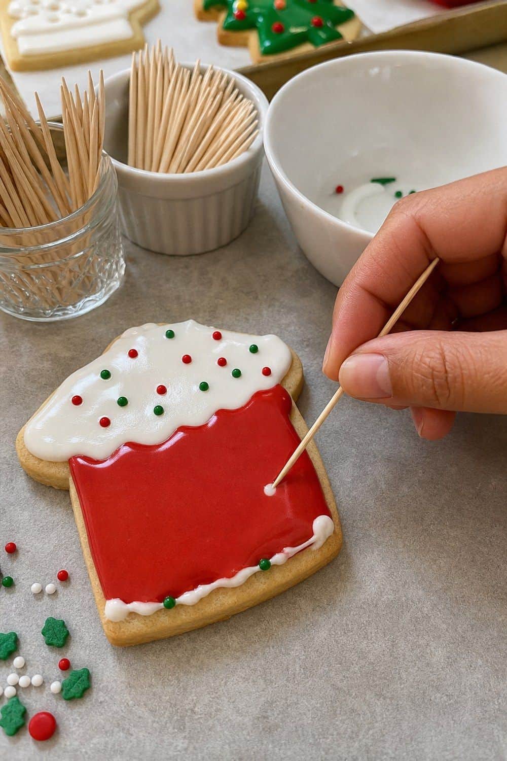25 Christmas Cookie Decorating Party Ideas for Easy Hosting Toothpicks for Tiny Fixes setup for a Christmas cookie decorating party