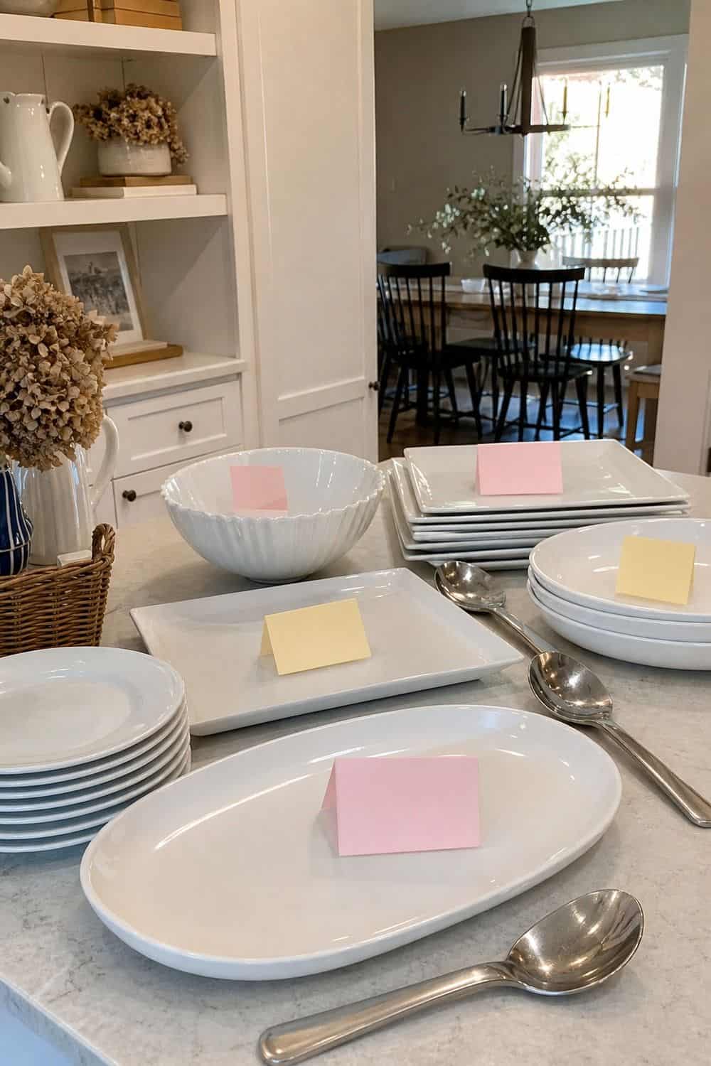 25 Christmas Kitchen Organization Ideas for Baking and Hosting serving platters assigned before the food is ready for Christmas kitchen organization.