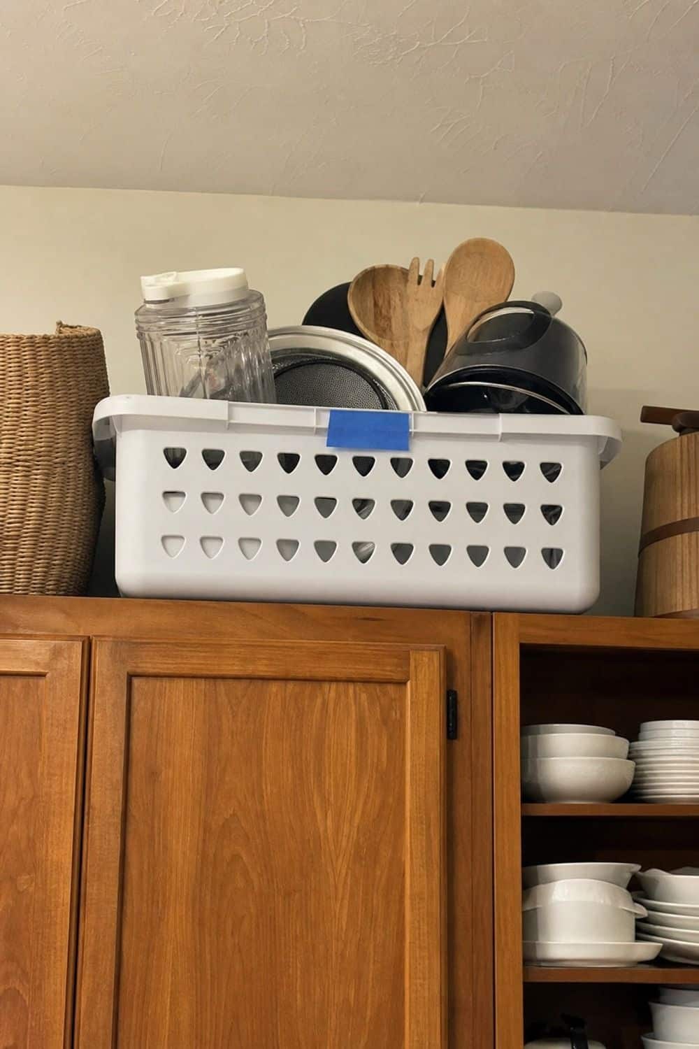 25 Christmas Kitchen Organization Ideas for Baking and Hosting temporary holding spot for non-holiday tools for Christmas kitchen organization.