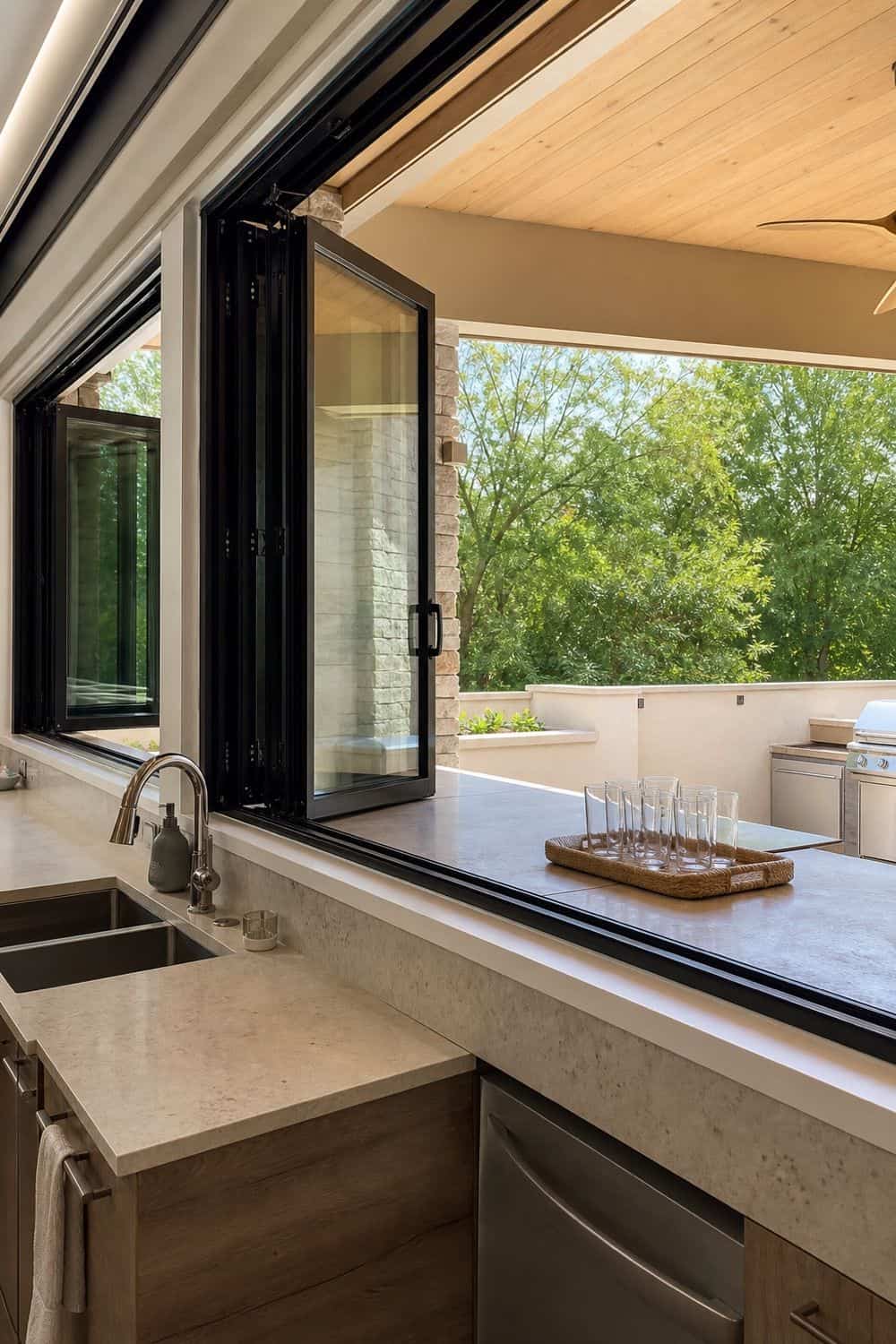 25 Contemporary Kitchen Ideas for a Clean, Polished Layout 24. Kitchen Connected to Outdoor Serving